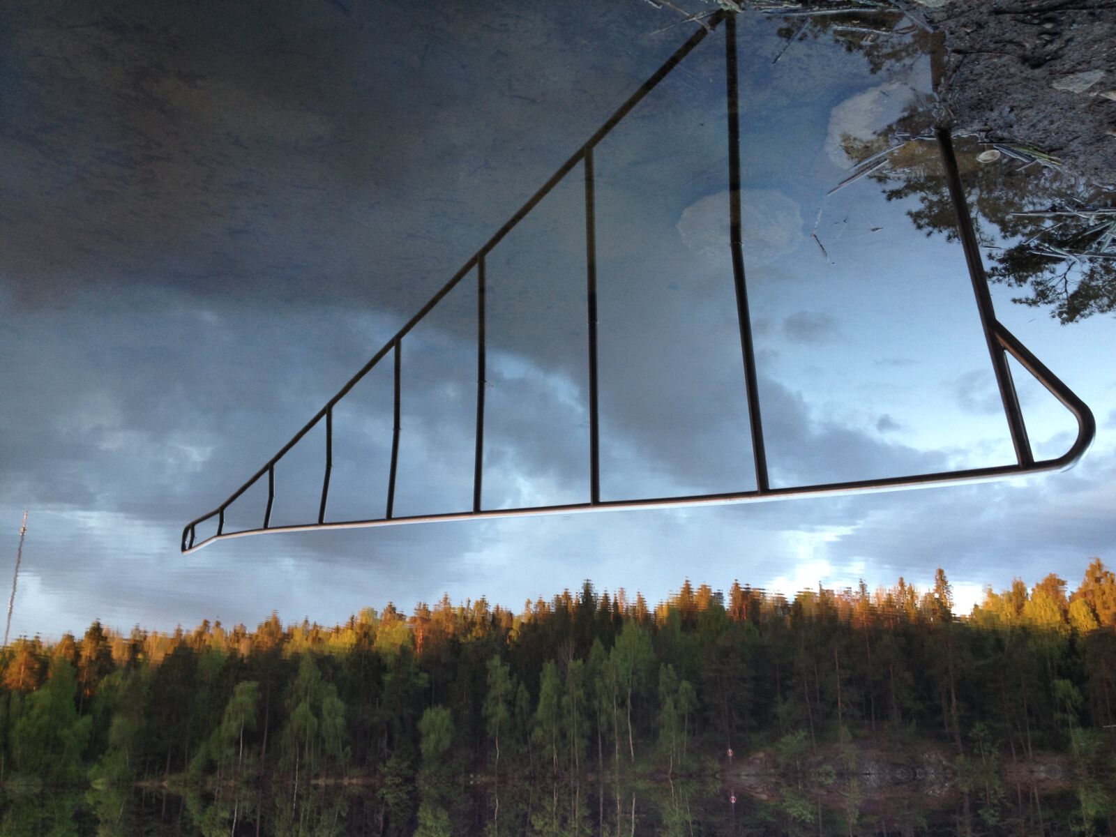 iPhone 4S back camera 4.28mm f/2.4 sample photo. Railing, sky, trees, water photography