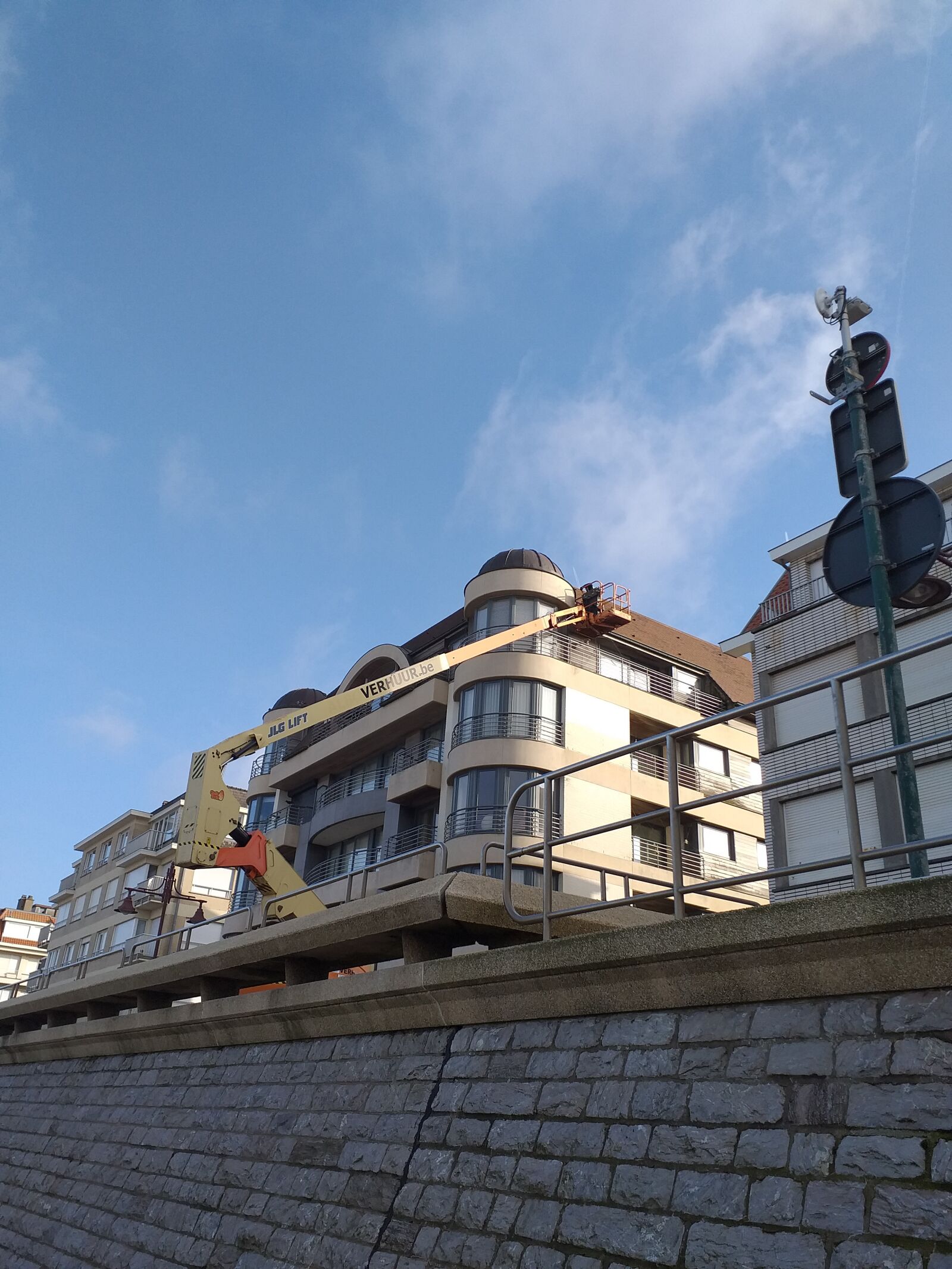 Samsung Galaxy J4+ sample photo. Building, blue, sky photography
