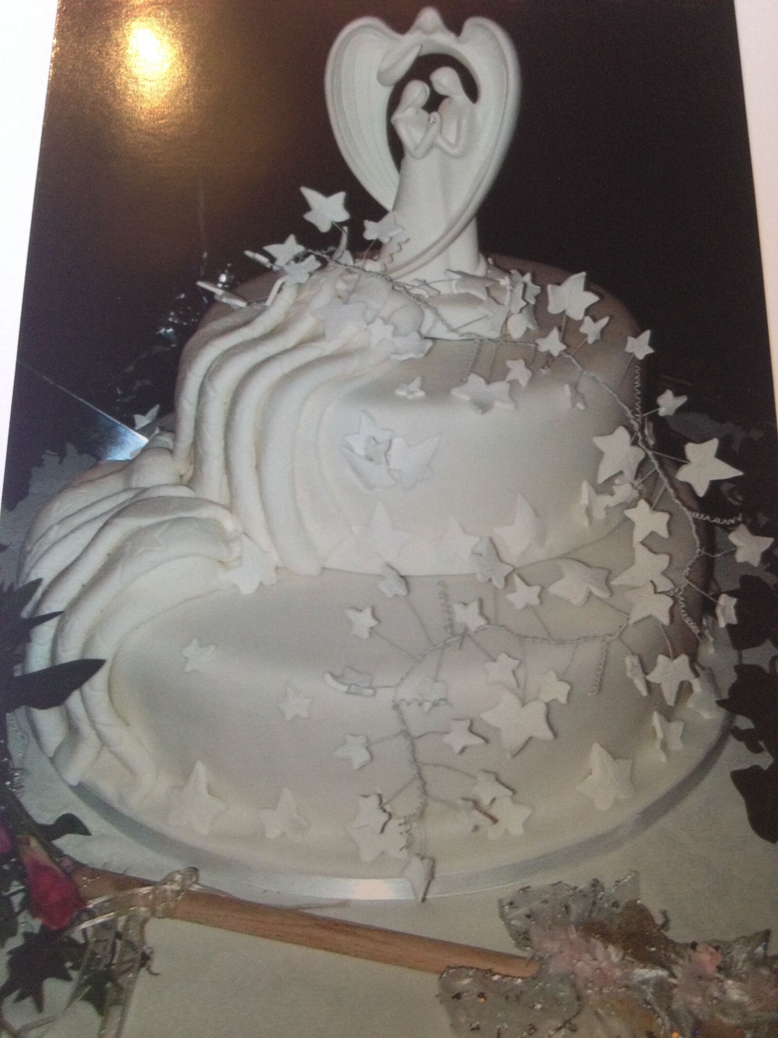 iPhone 4S back camera 4.28mm f/2.4 sample photo. Wedding cake, angel, bride photography