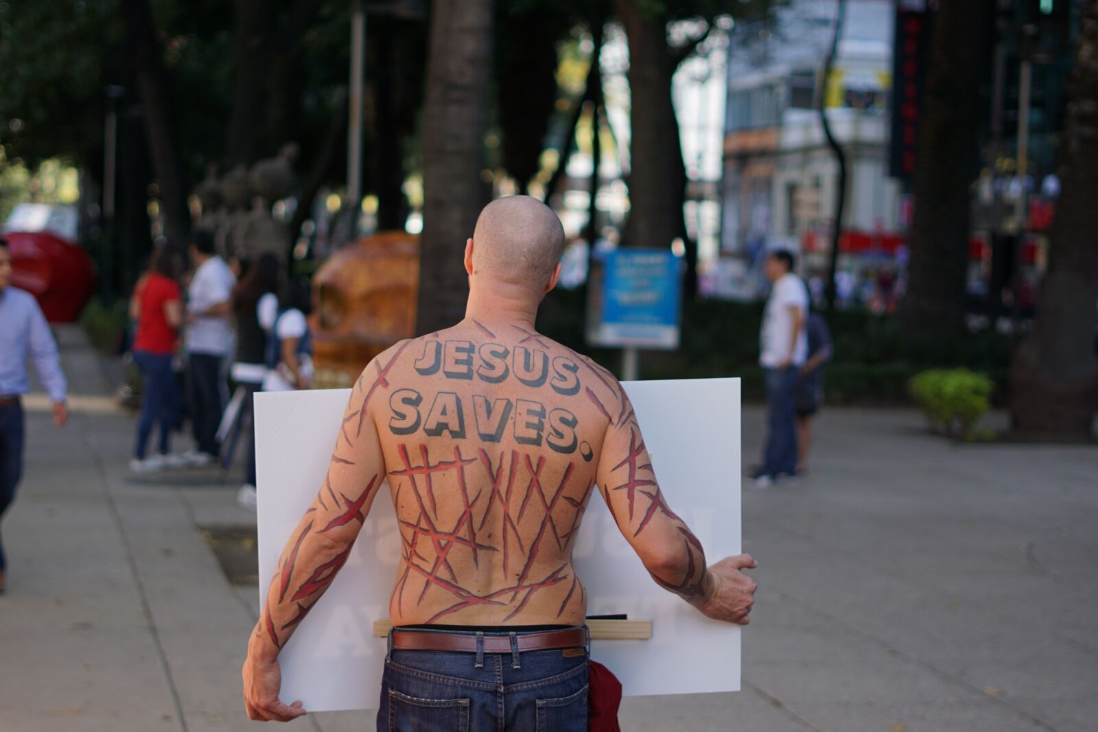 Sony FE 50mm F1.8 sample photo. People, street, man photography
