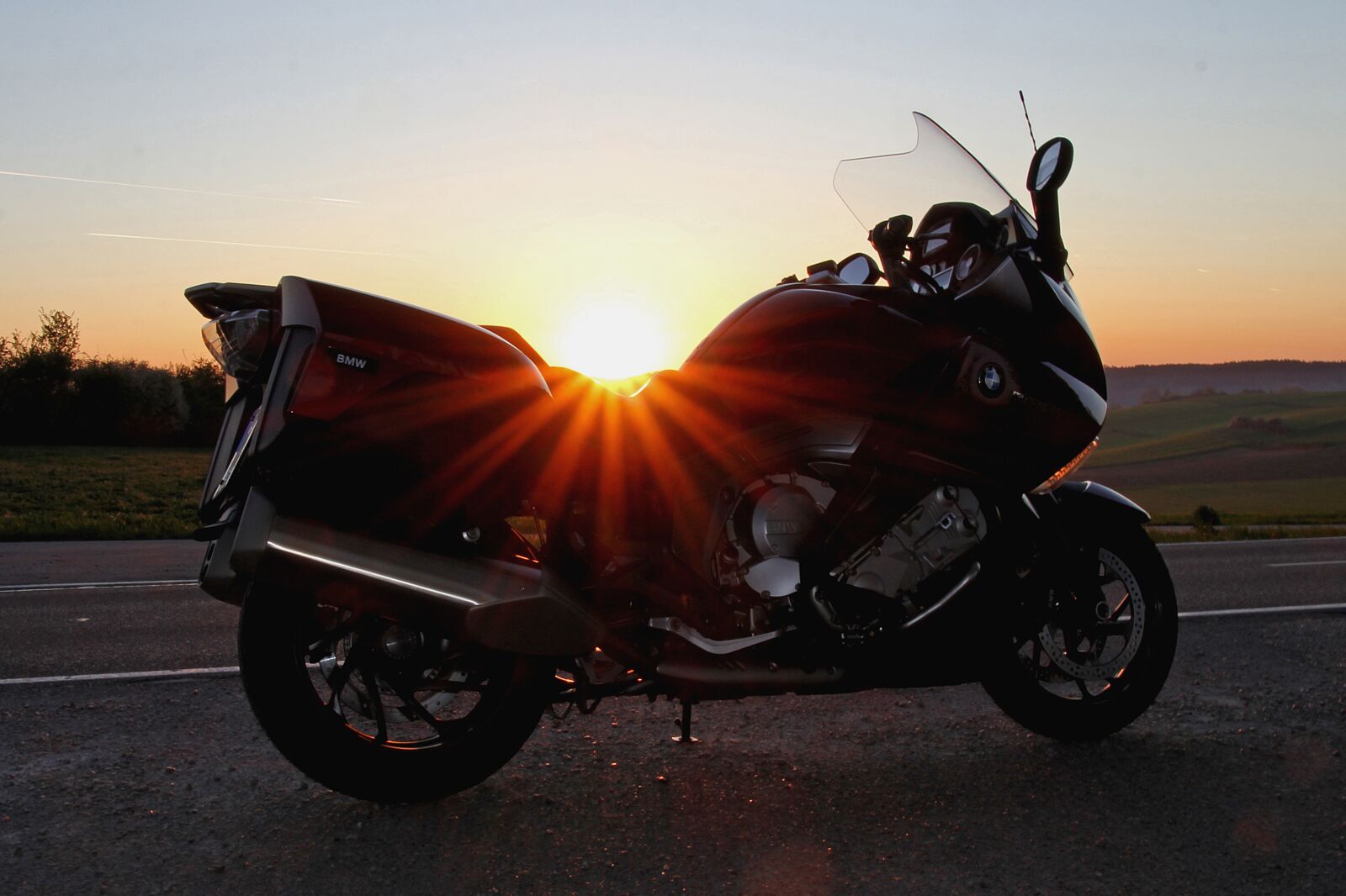 Canon EOS 60D sample photo. Motorcycle, sun, sunrise photography