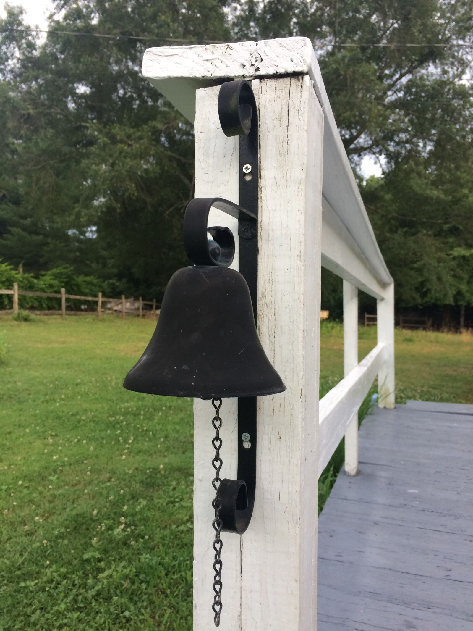 iPhone 5s back camera 4.15mm f/2.2 sample photo. Bell, porch, fence photography