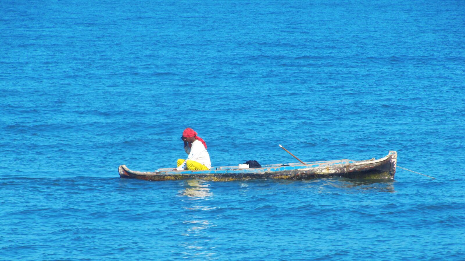 Canon PowerShot SX200 IS sample photo. Canoe, cartagena, fisherman photography