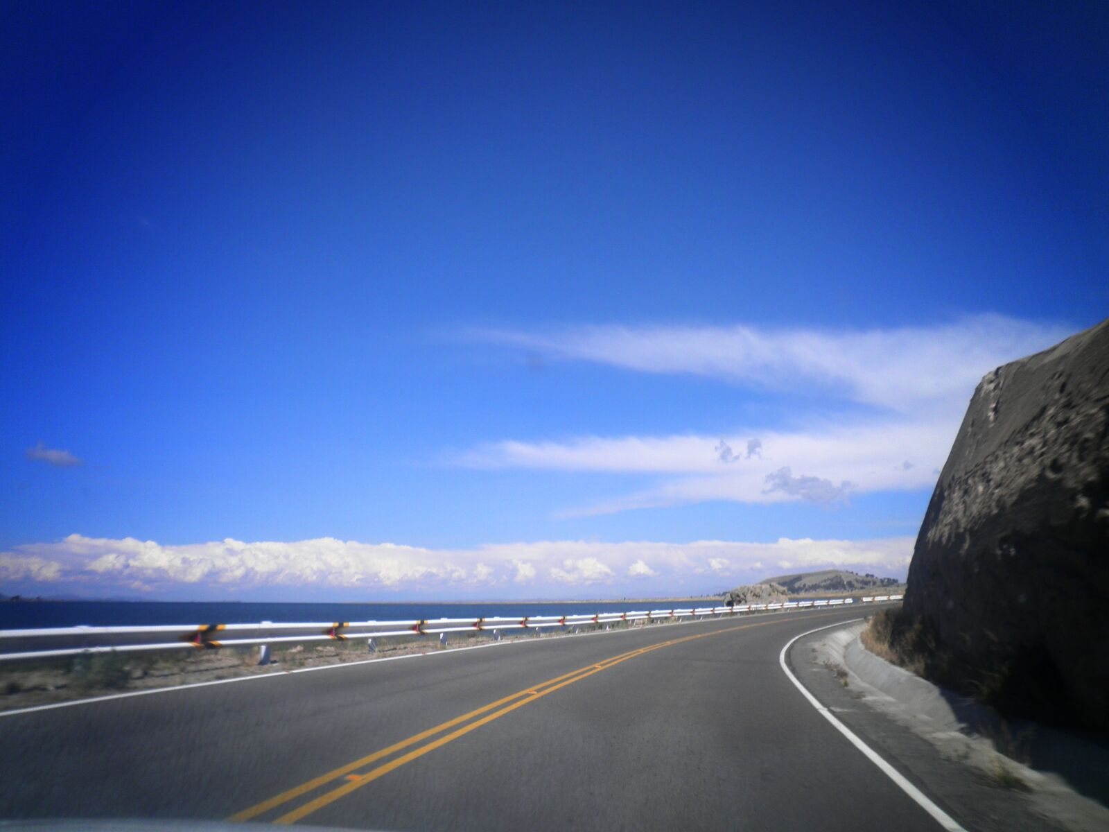 Olympus FE4030,X950 sample photo. Road, track, clouds photography