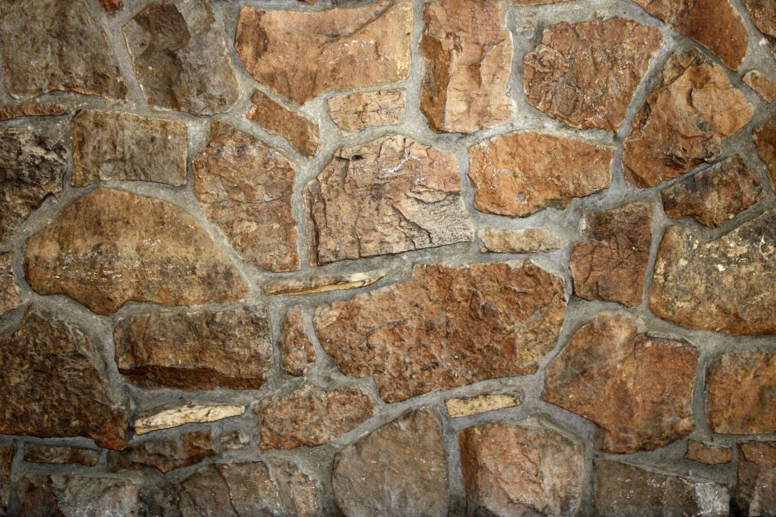 f/3.5-5.6 IS sample photo. Brown rock, wall, texture photography