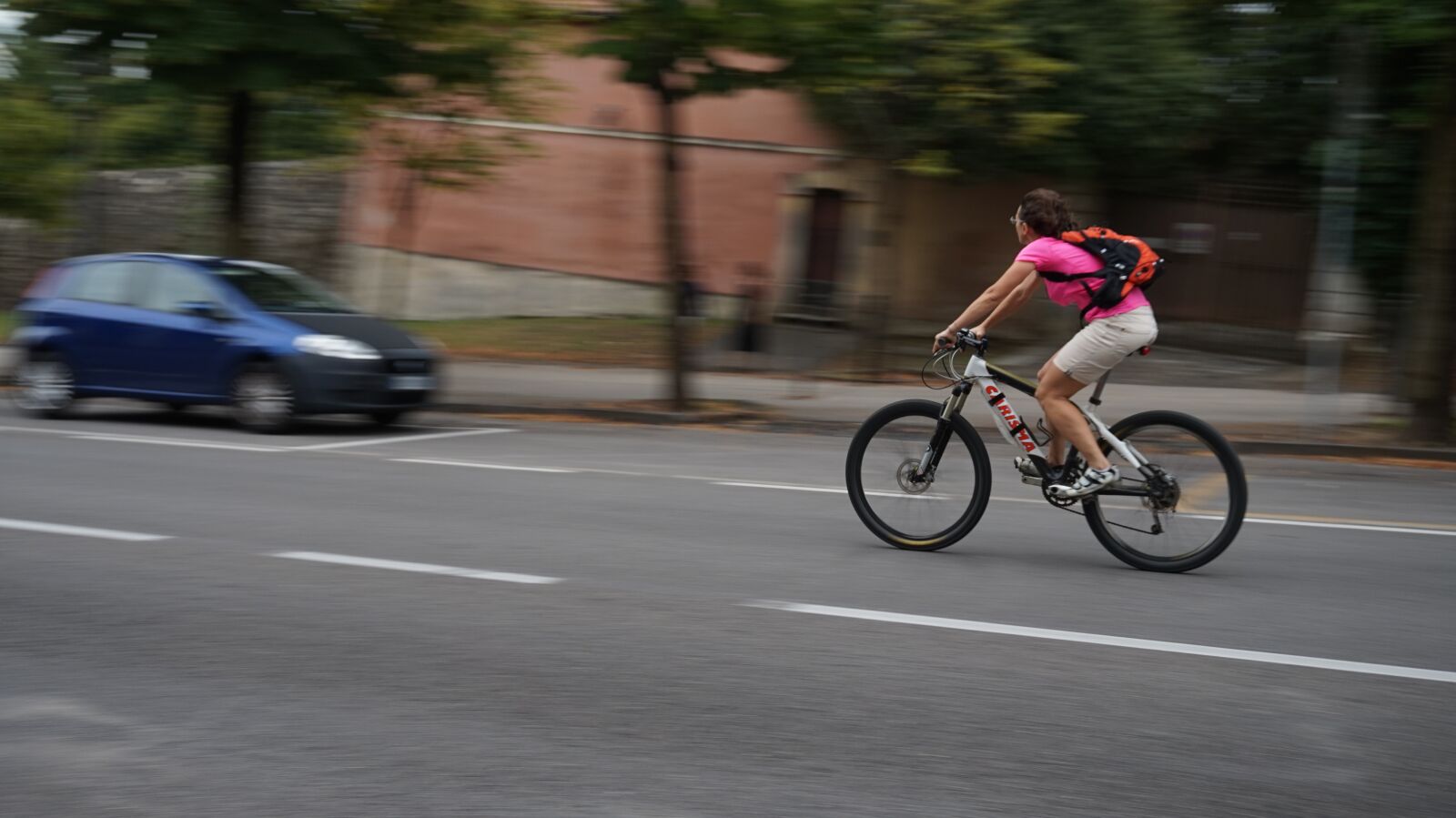 Sony Alpha a5000 (ILCE 5000) sample photo. Blur, bike, cyclists photography