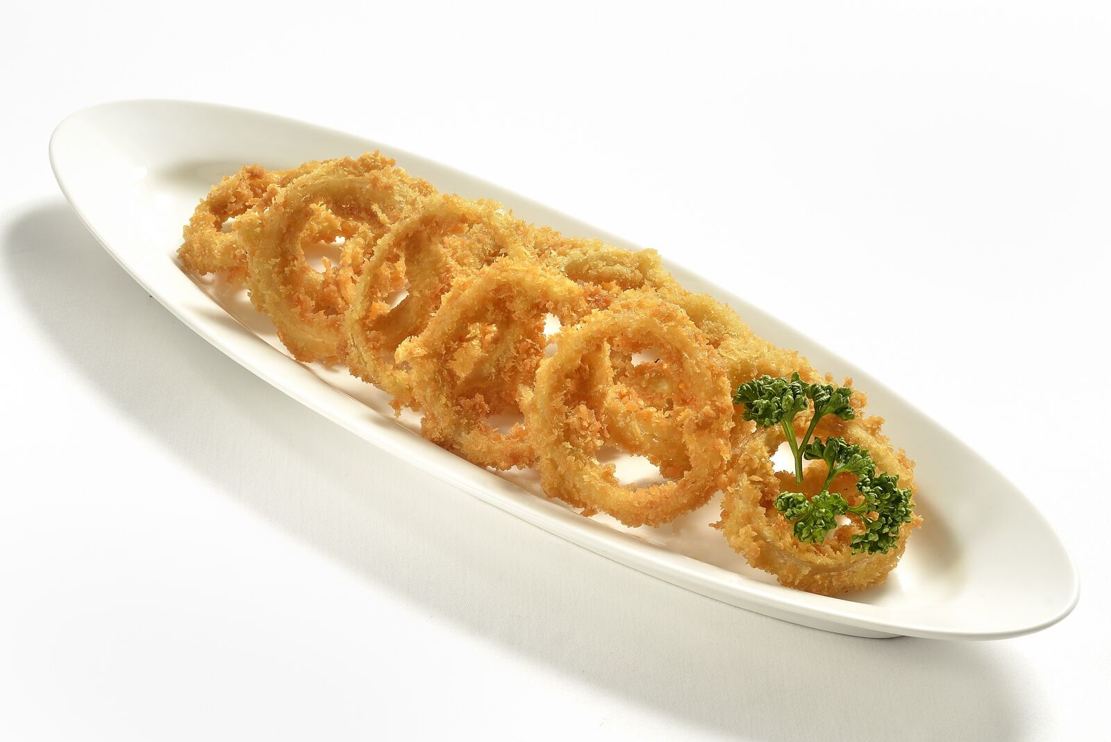 Nikon D7000 sample photo. Onion rings, fast food photography