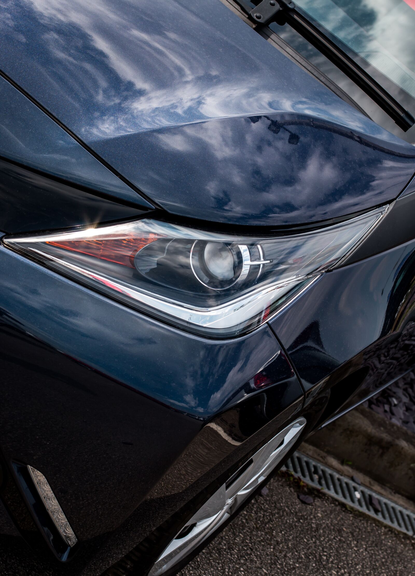 Canon EF 50mm F1.4 USM sample photo. Headlight, car, modern photography