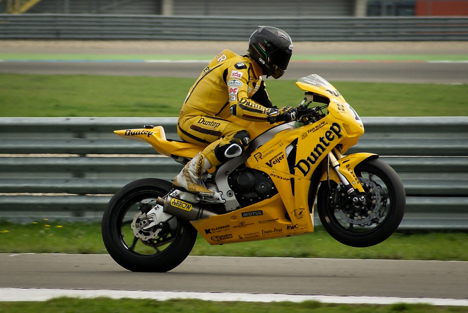 Sony Alpha DSLR-A230 sample photo. Person, motor, racing, motorbike photography