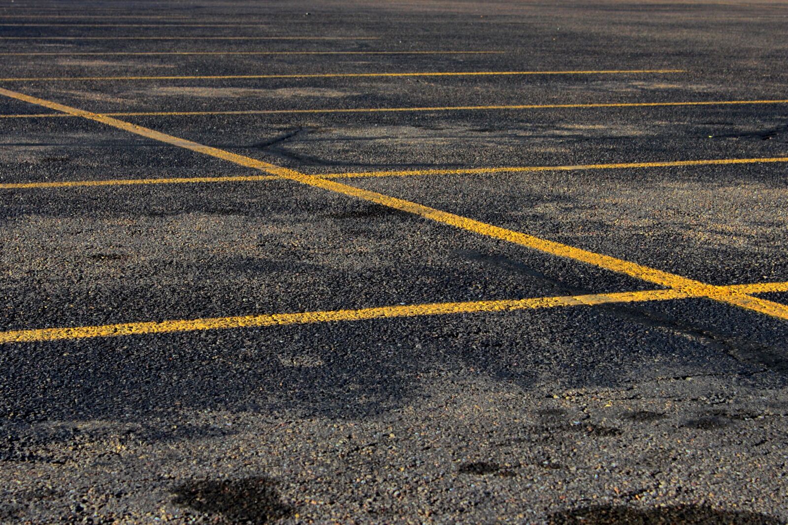f/3.5-5.6 IS sample photo. Parking lot, asphalt photography