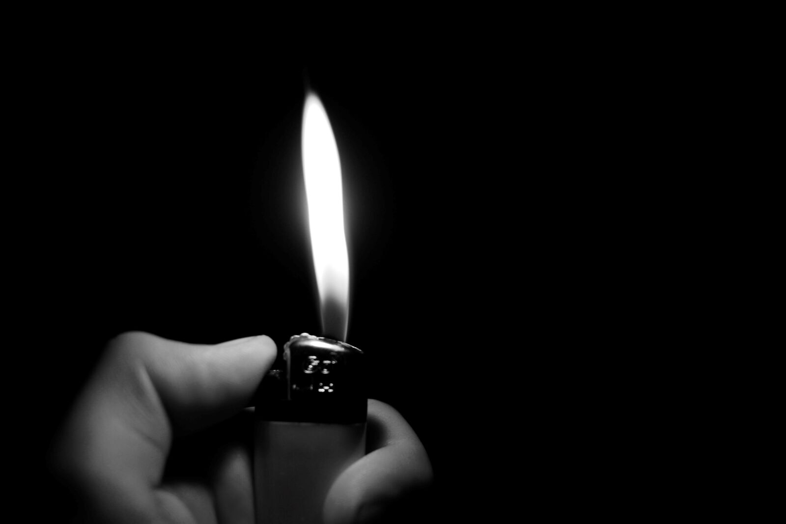 Canon EF-S 24mm F2.8 STM sample photo. Lighter, flame, fire photography