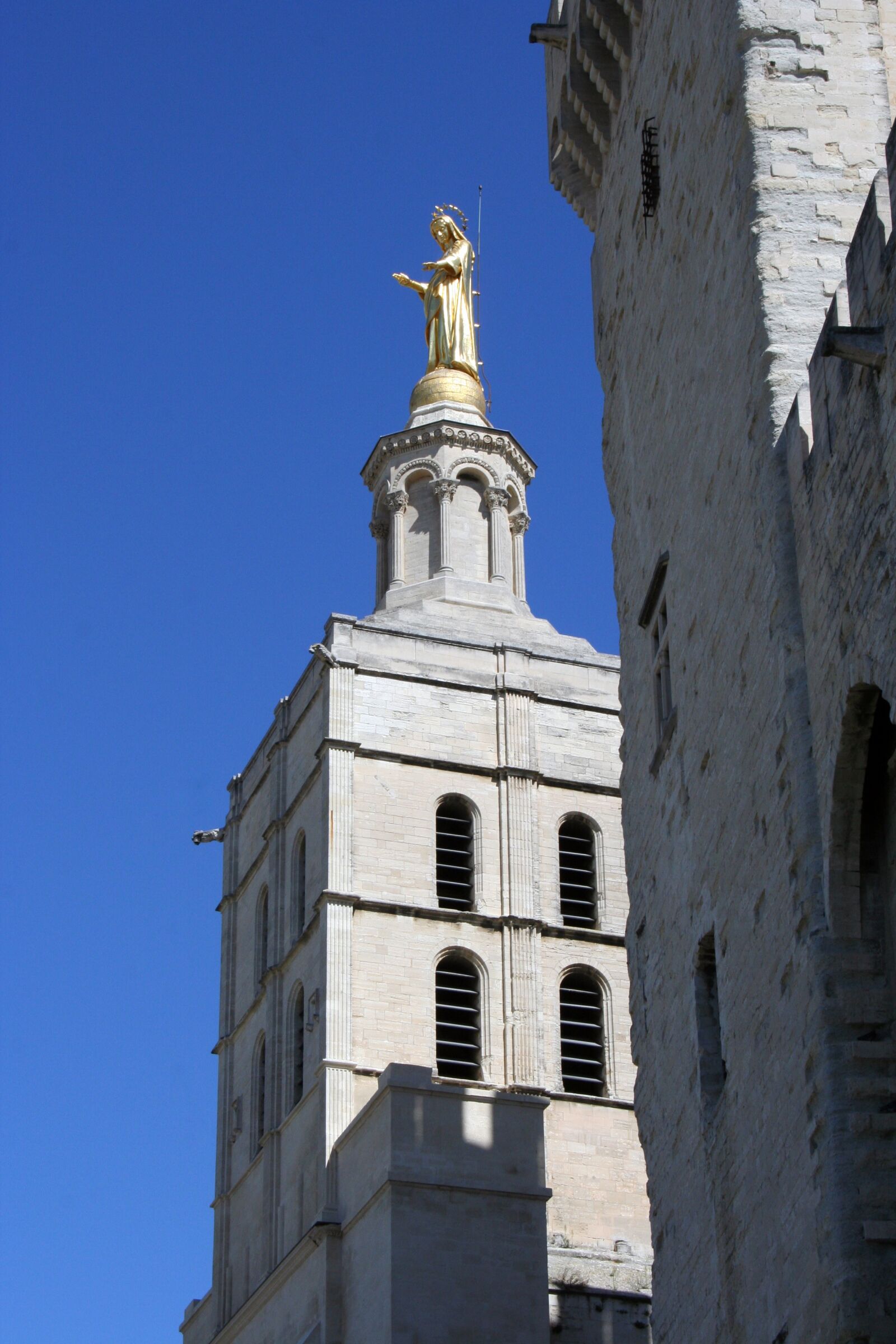 Canon EOS 350D (EOS Digital Rebel XT / EOS Kiss Digital N) sample photo. Statue, tower, paveslot photography