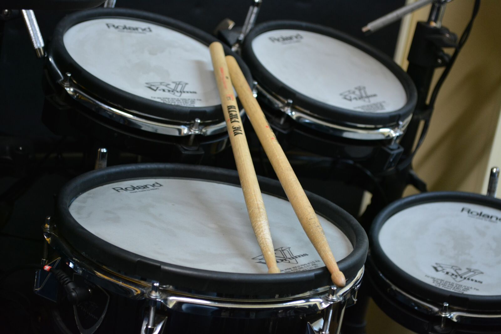 Nikon D5200 sample photo. Drumsticks, battery, music photography