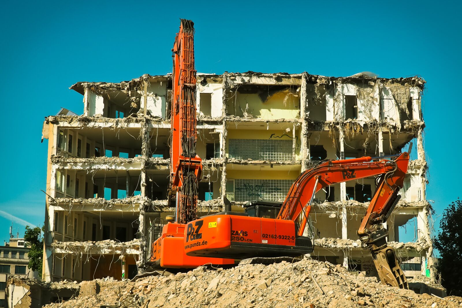 Olympus OM-D E-M10 sample photo. Site, excavators, construction work photography