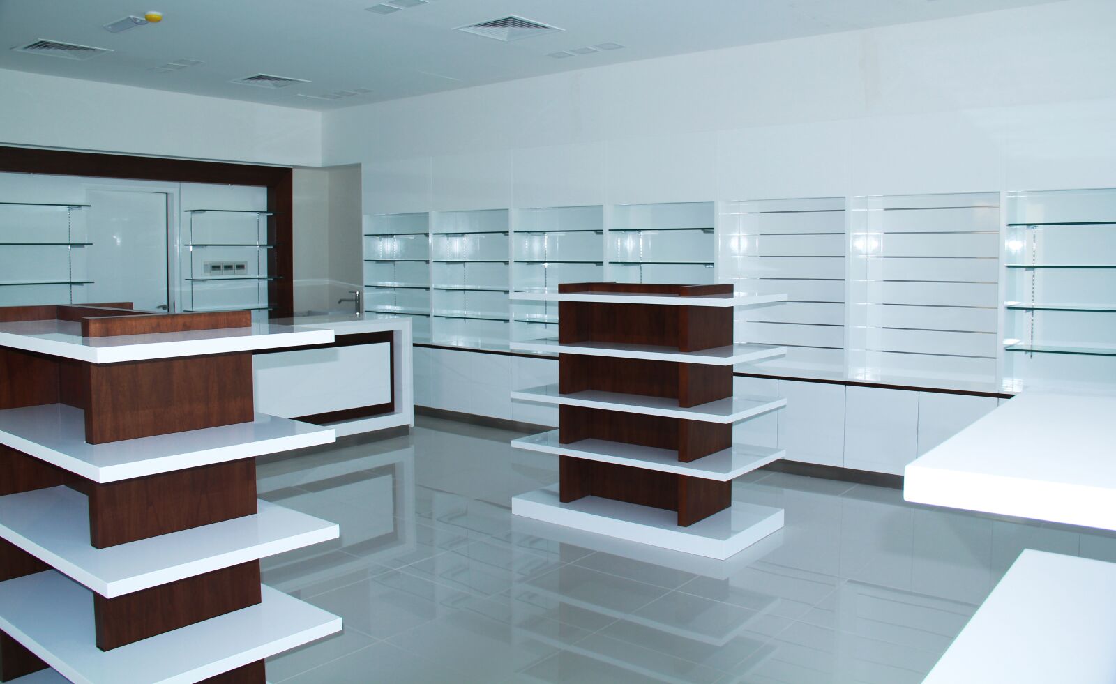Canon EF-S 18-135mm F3.5-5.6 IS sample photo. Pharmacy, shelving, design photography