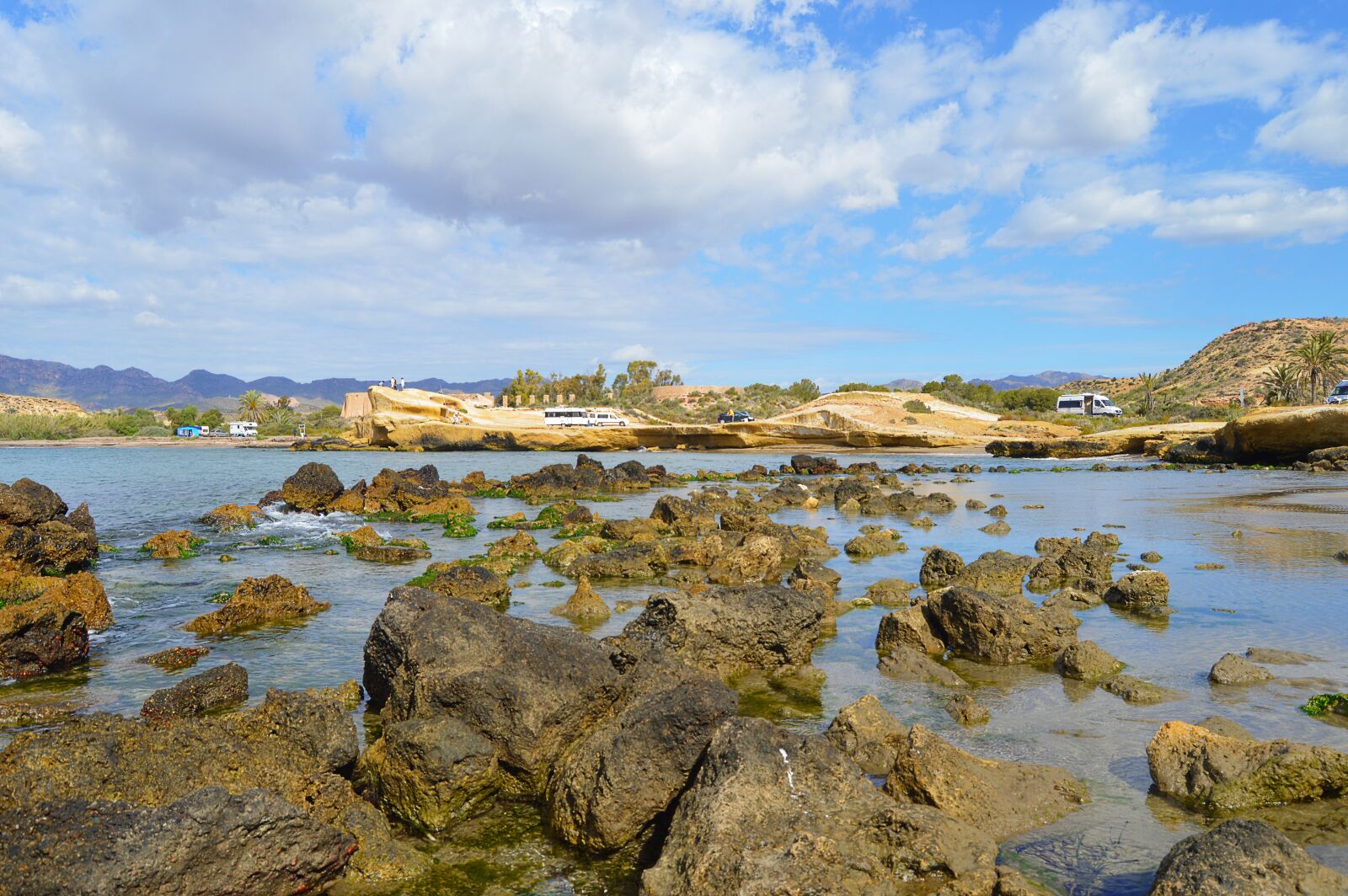 Nikon D3200 sample photo. Beach with rocks, cala photography
