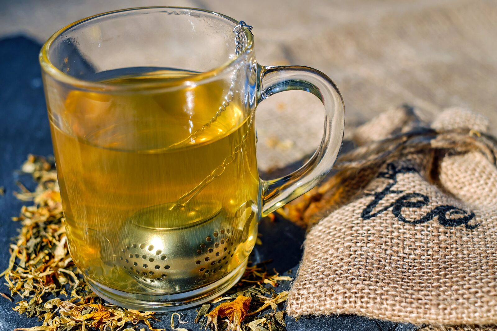 Fujifilm X-T10 + Fujifilm XF 35mm F1.4 R sample photo. Tee, glass, tea infuser photography