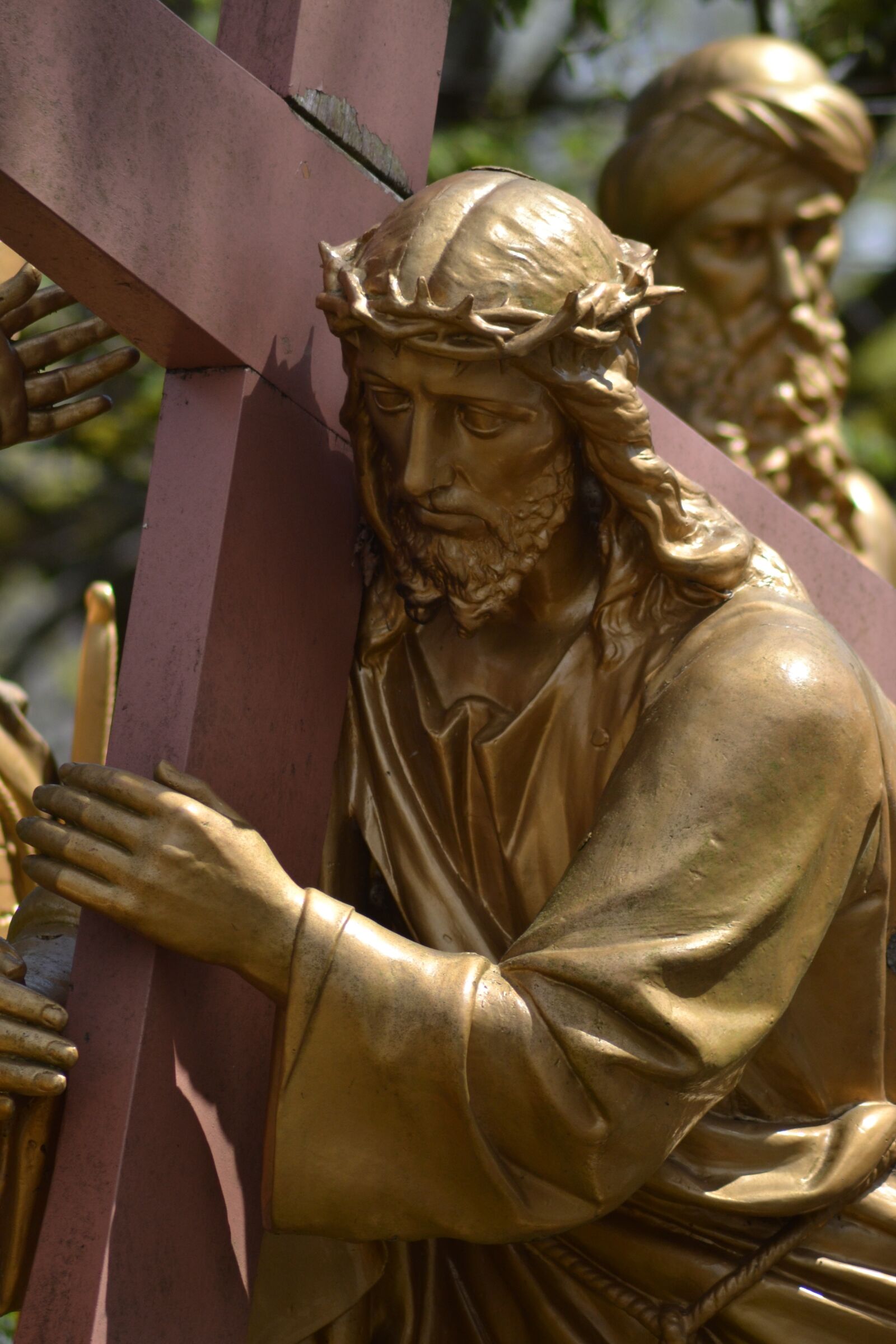Nikon D3100 sample photo. Statue, man, cross photography