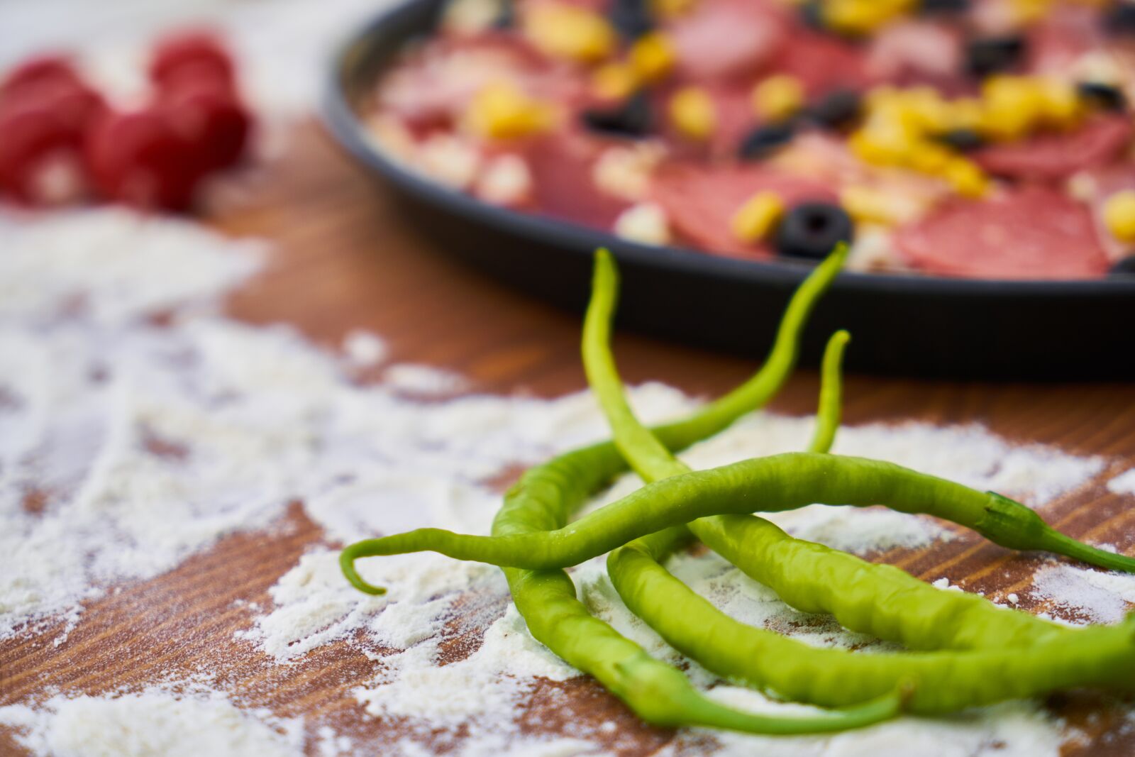 Sony a7R II sample photo. Pizza, dough, hot photography