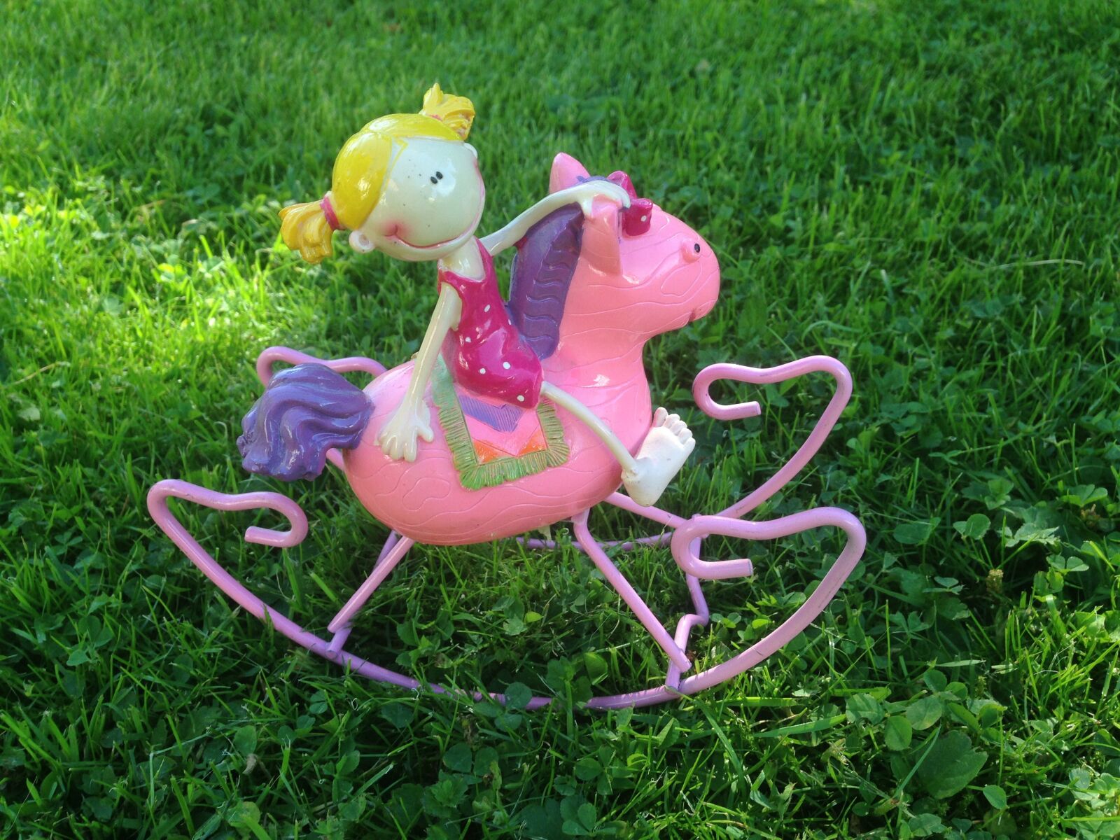iPhone 5c back camera 4.12mm f/2.4 sample photo. Toy, girl, horse photography