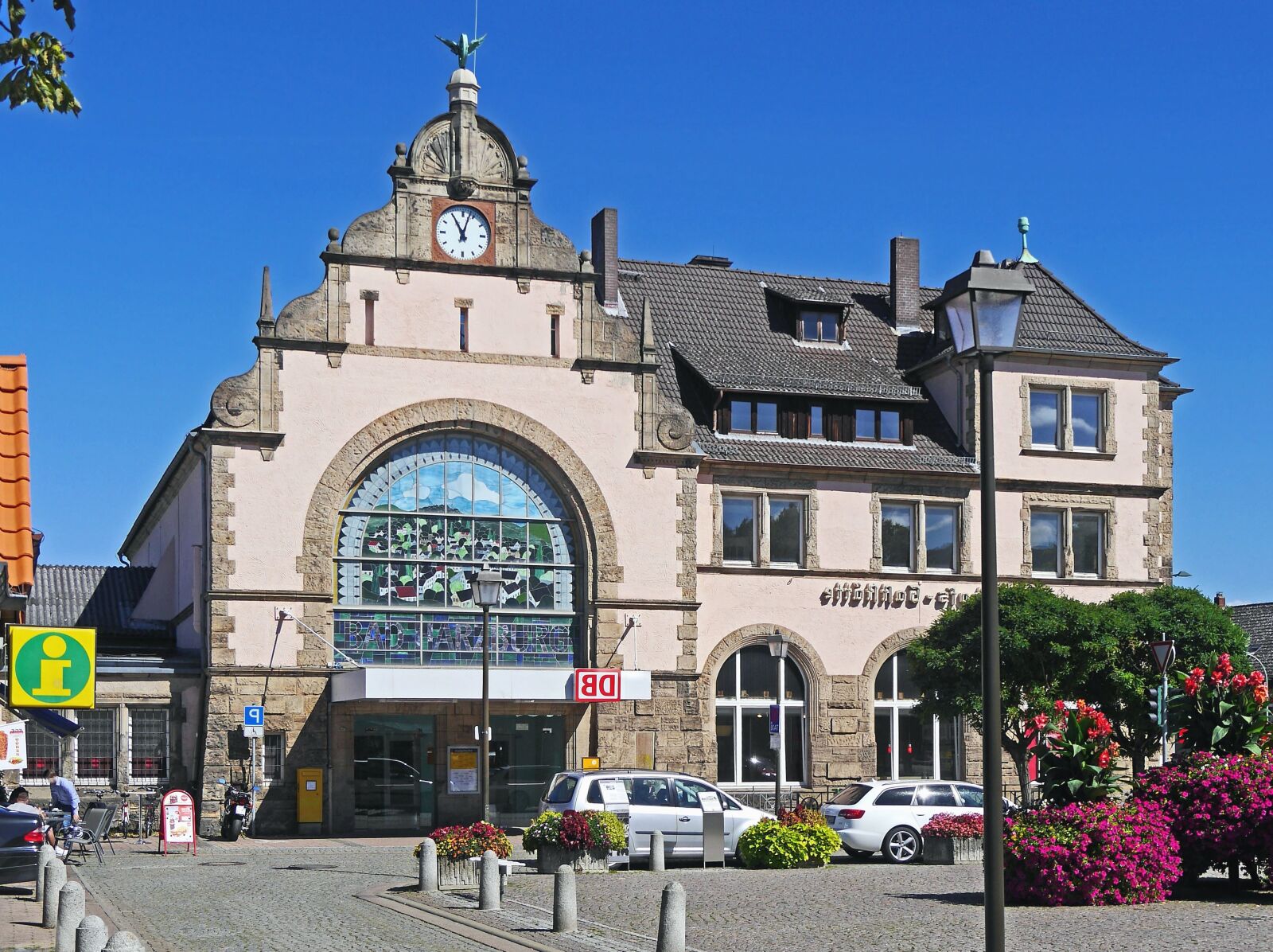 Panasonic Lumix DMC-GH3 sample photo. Clock, house, architecture, people photography