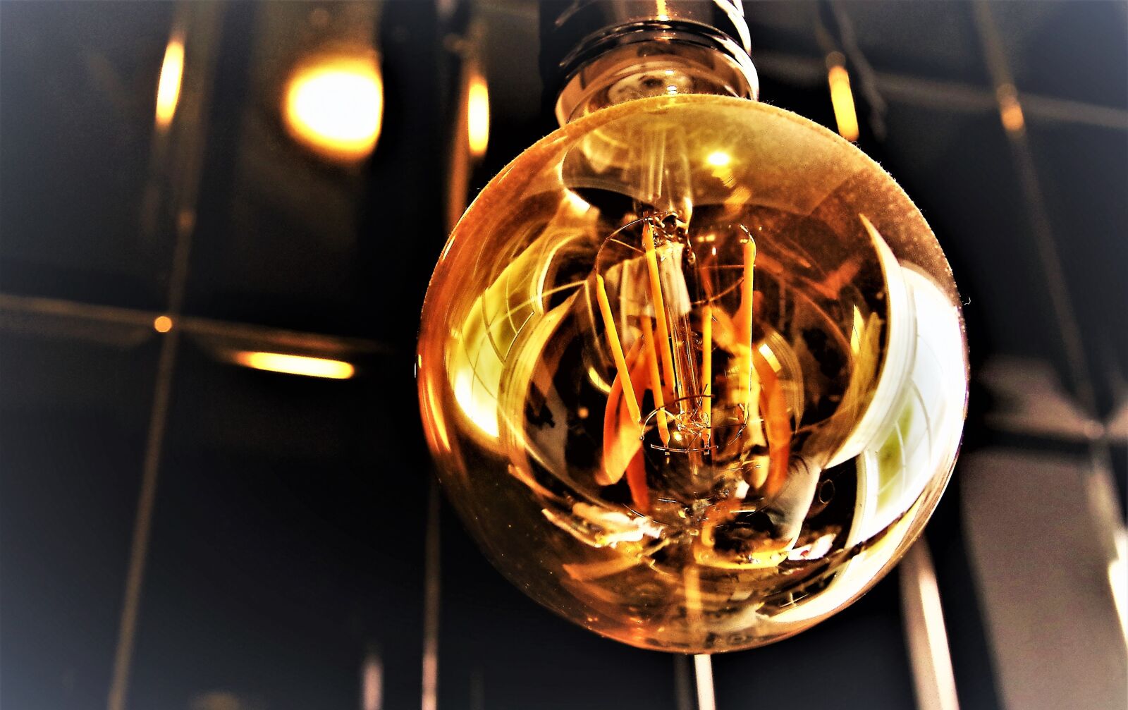 Pentax K-30 sample photo. Light bulb, heat, golden photography