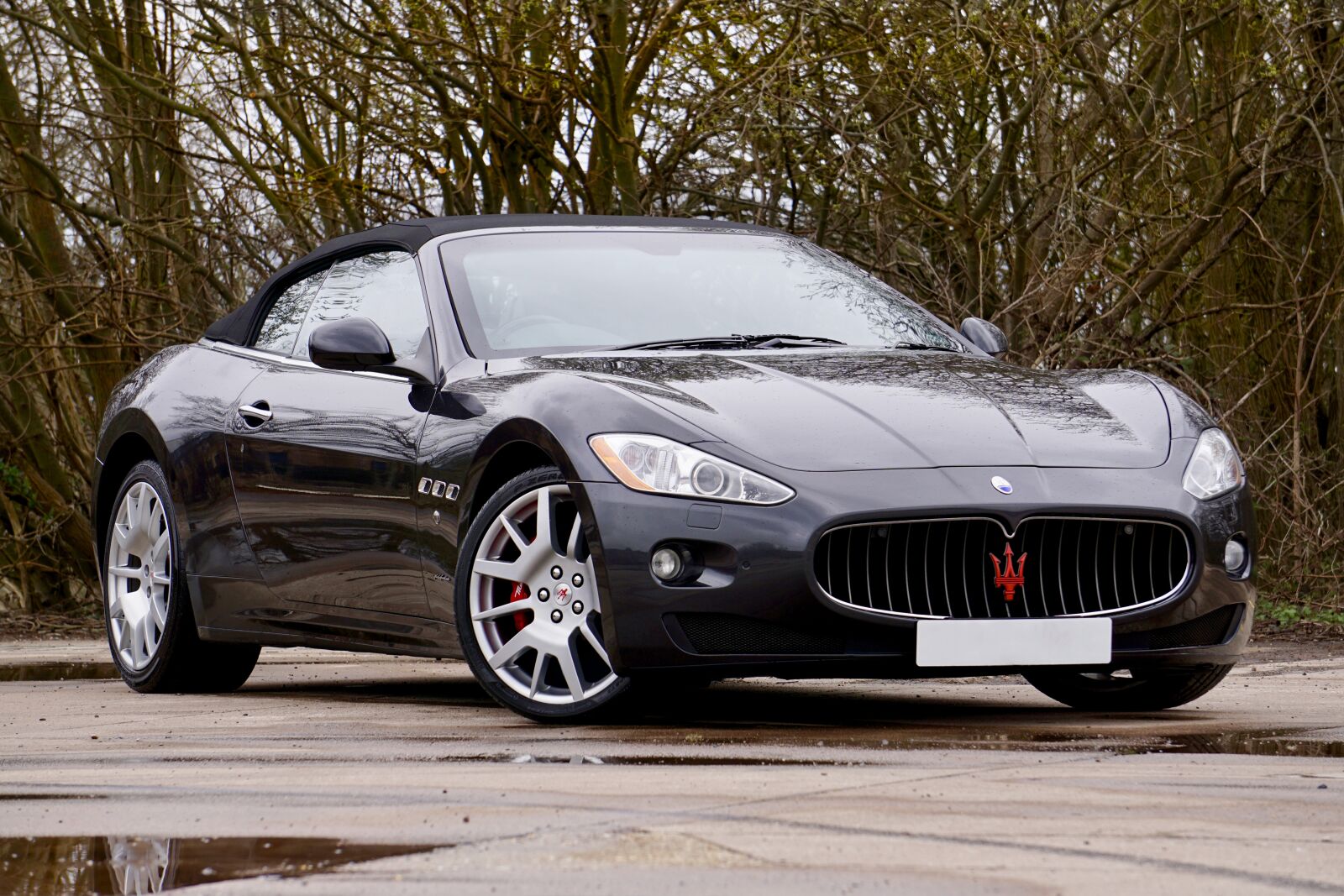 Sony E 55-210mm F4.5-6.3 OSS sample photo. Car, vehicle, wheel photography