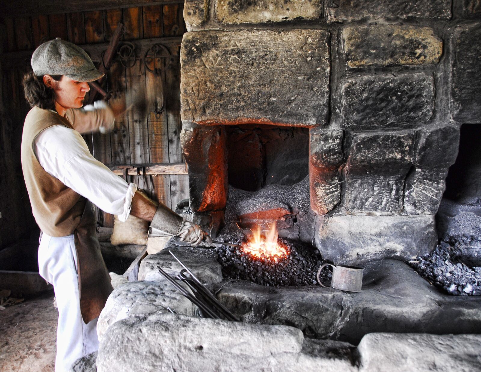 Nikon D200 sample photo. Blacksmith, working, metal photography