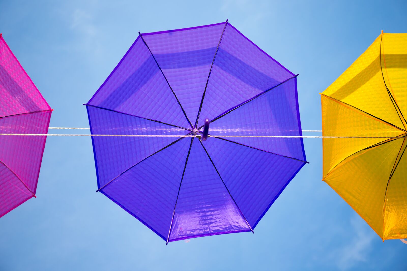 Canon EF 24-70mm F4L IS USM sample photo. Umbrellas, summer, sky photography