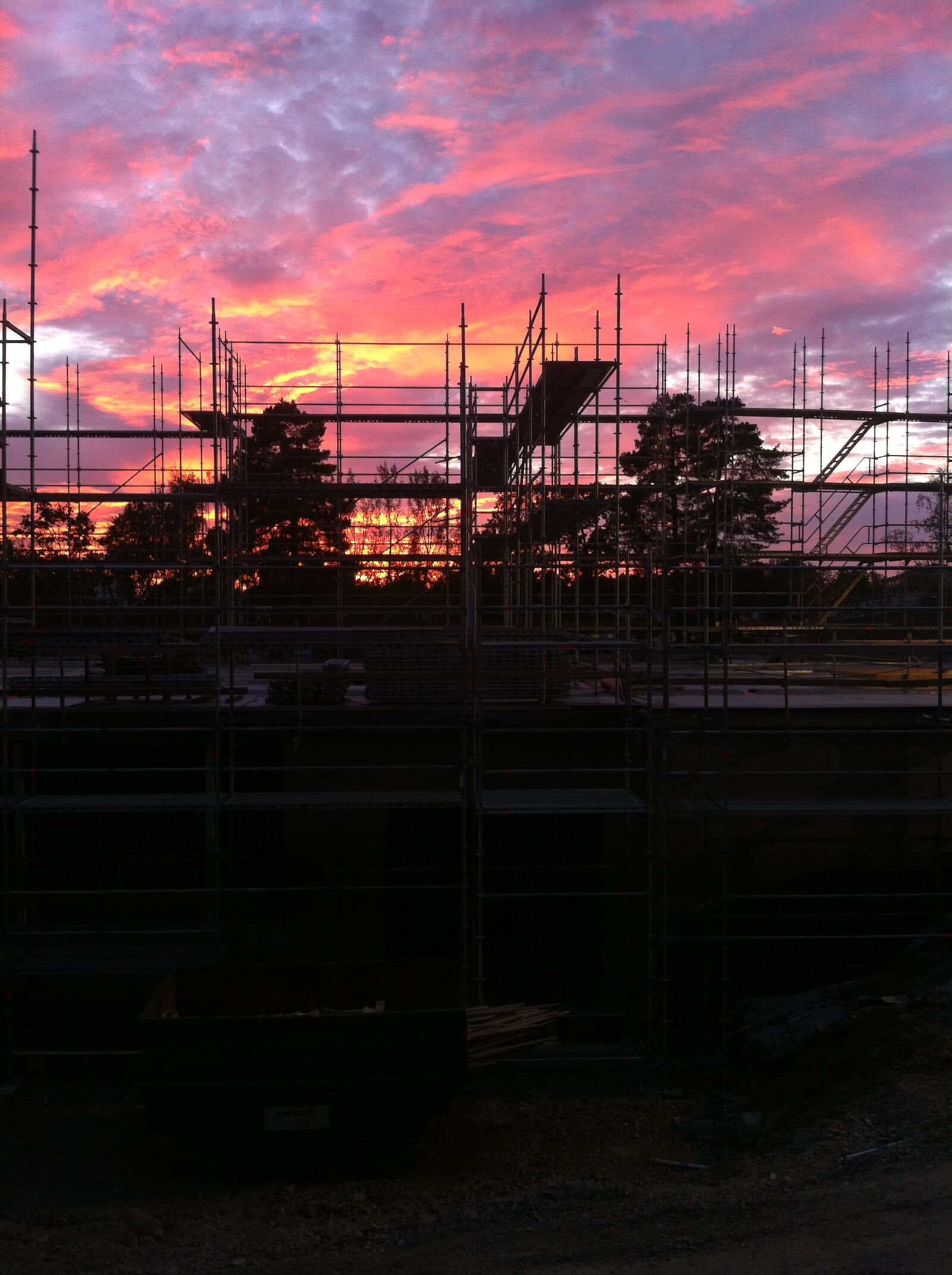 iPhone 4 back camera 3.85mm f/2.8 sample photo. Construction, stockholm, sunset photography
