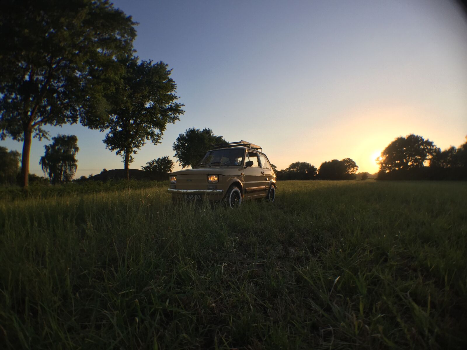 iPhone 6 back camera 4.15mm f/2.2 sample photo. 126, barn, car, cross photography