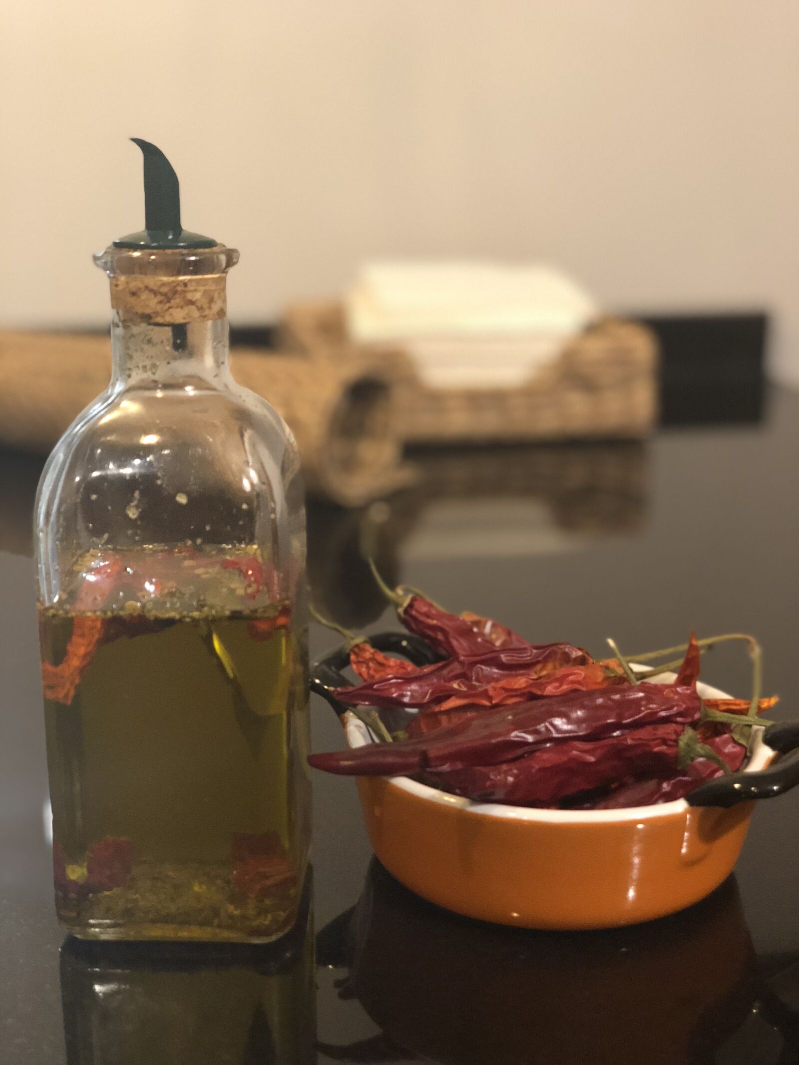 iPhone X back dual camera 6mm f/2.4 sample photo. Oil, red hot peppers photography