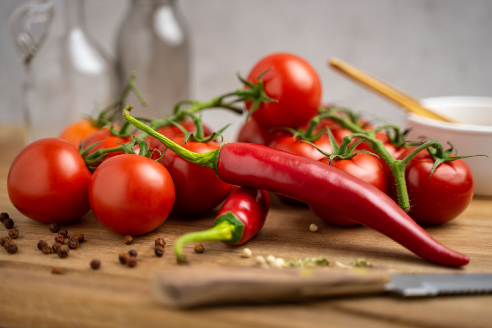 Tamron 28-75mm F2.8 Di III RXD sample photo. Tomatoes, knife, towel photography