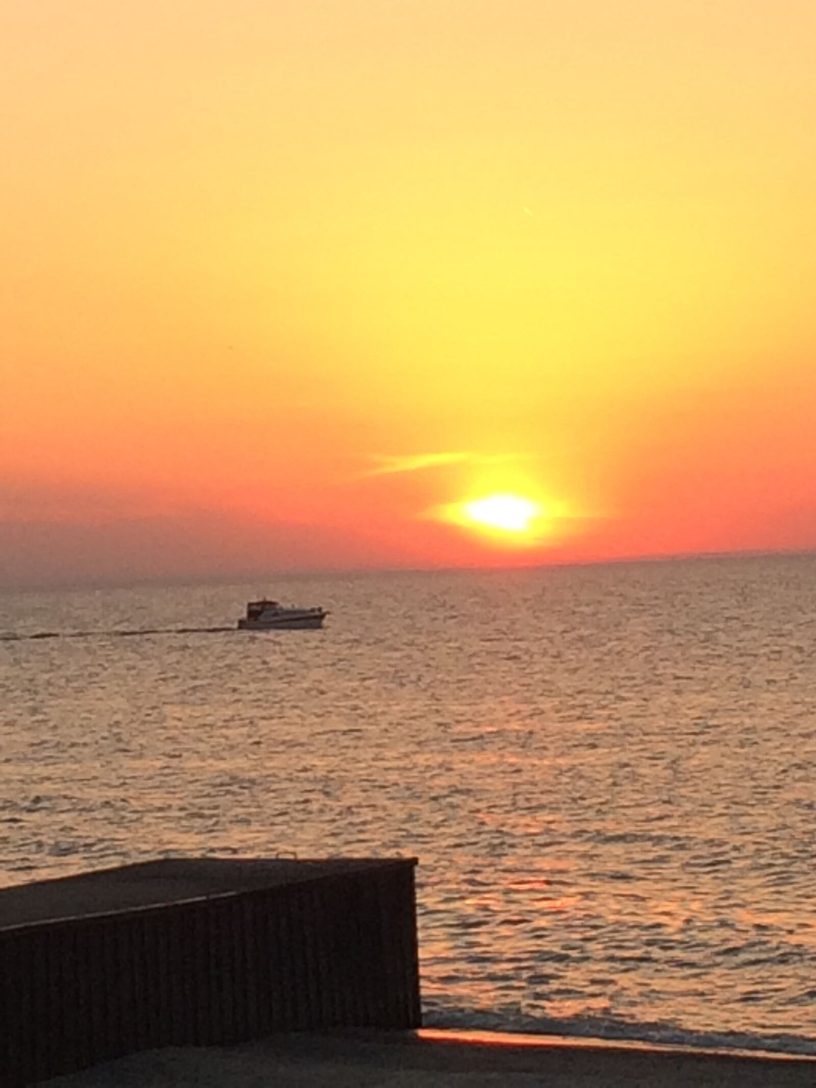 iPhone 5s back camera 4.12mm f/2.2 sample photo. Sunset, boat, grand beach photography