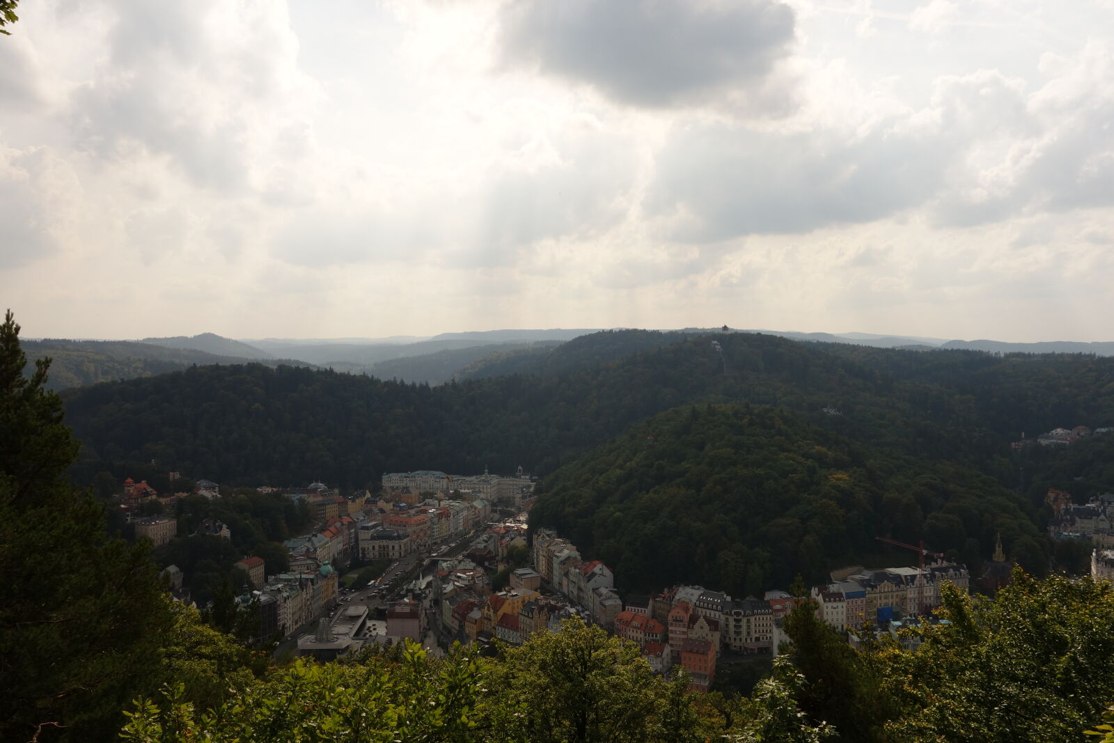 Sony Cyber-shot DSC-RX100 sample photo. City, clouds, hill, mountain photography