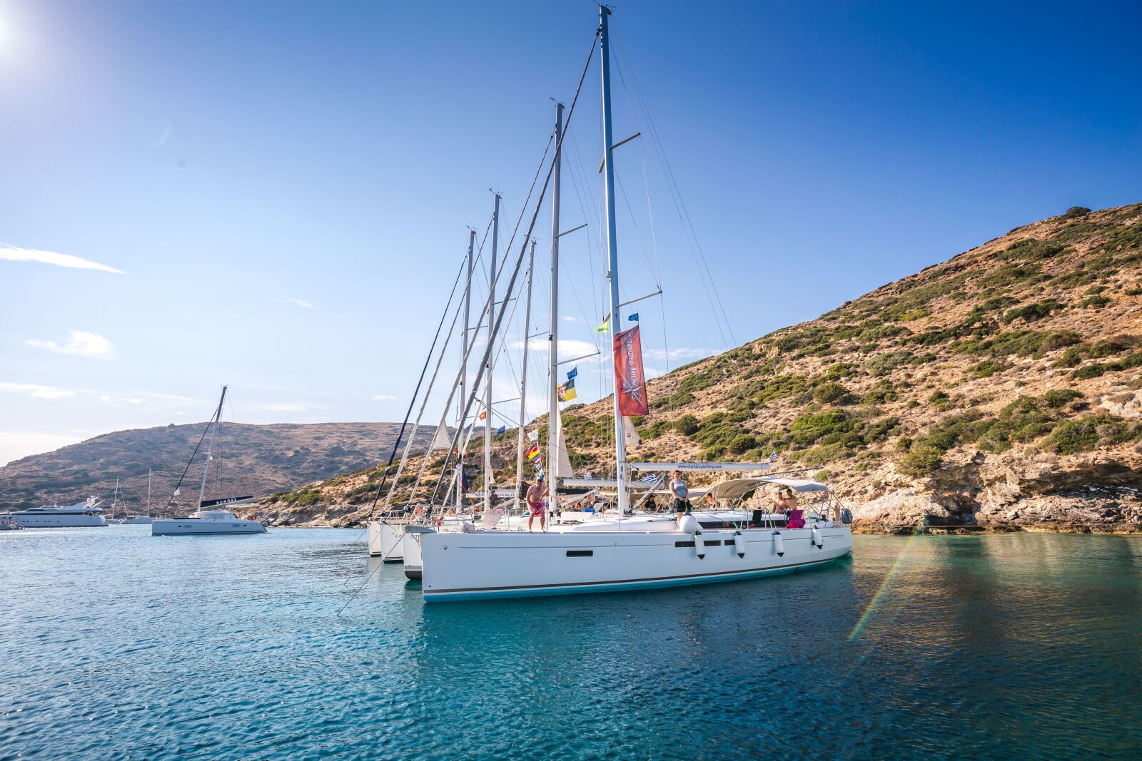 Canon EF 16-35mm F4L IS USM sample photo. Fleet, sail, sun photography