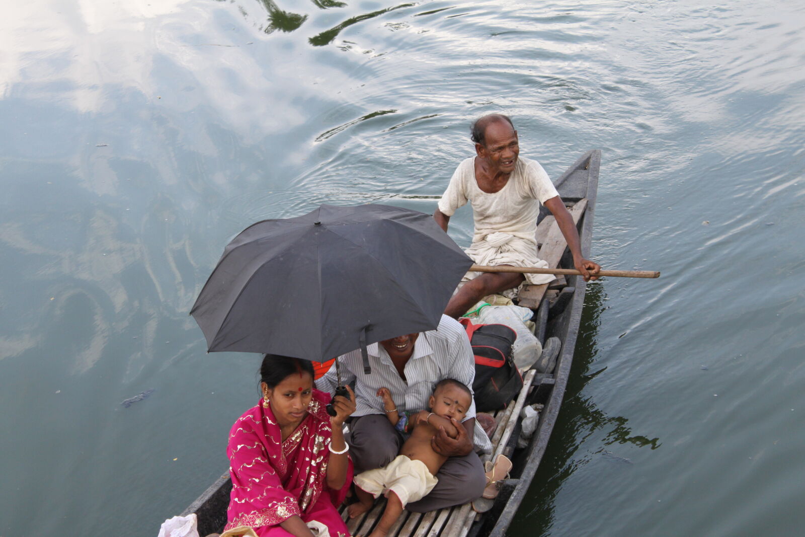 Canon EOS 500D (EOS Rebel T1i / EOS Kiss X3) sample photo. Bangladesh, canal, fisherman, flower photography