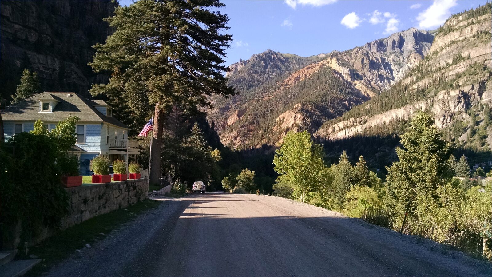 Motorola XT1080 sample photo. Dirt, road, house, mountains photography