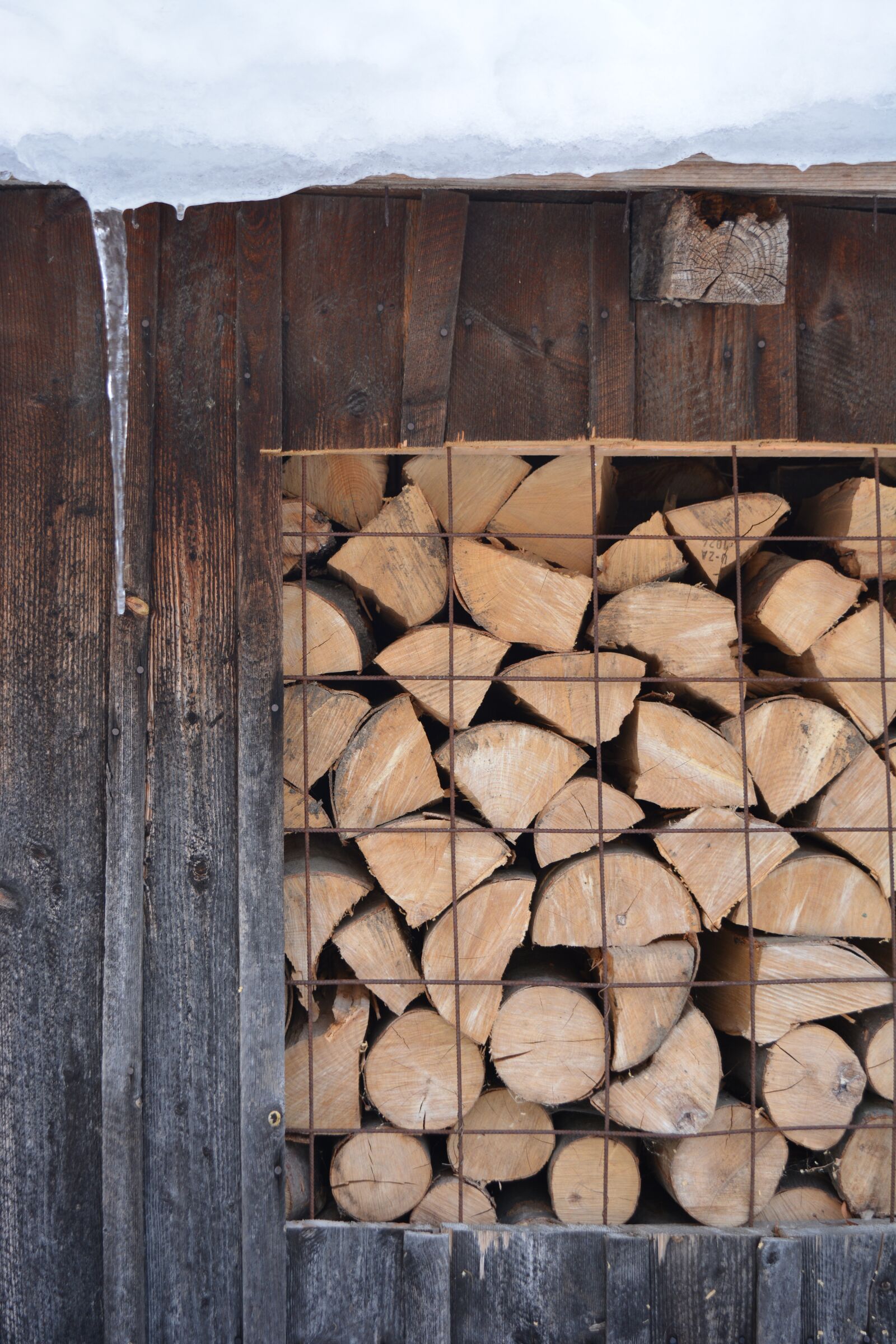 Nikon D5200 sample photo. Logs, wood, snow photography