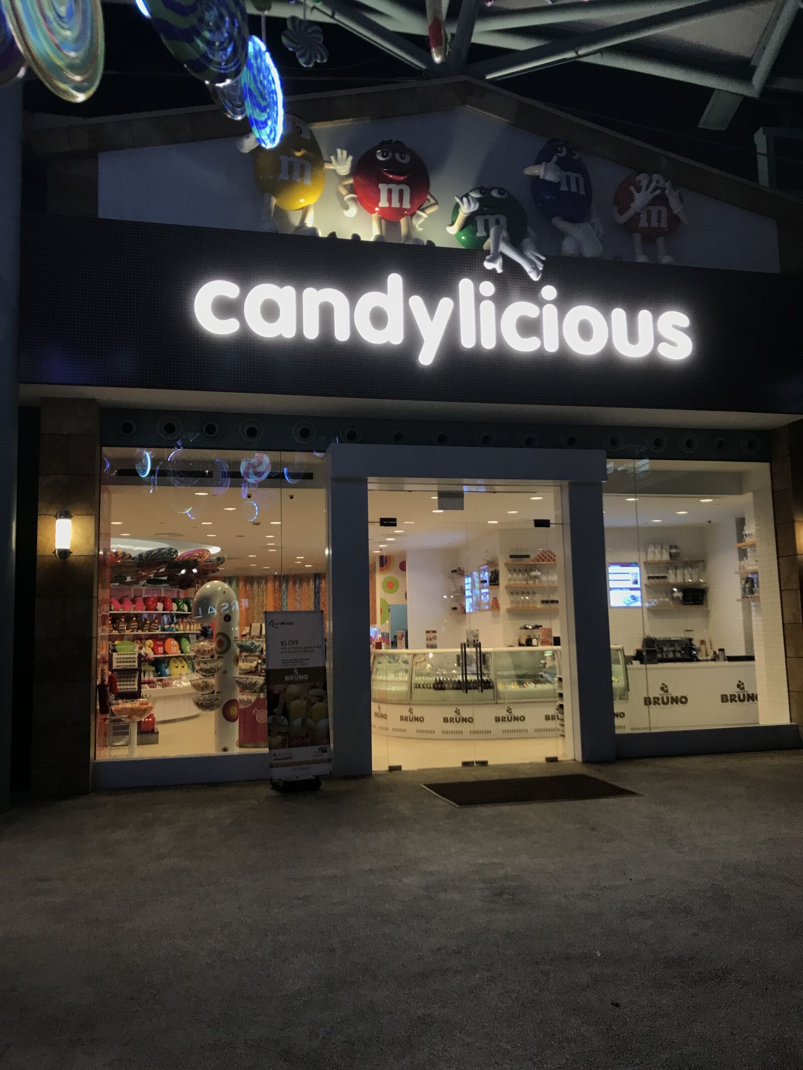 iPhone 7 back camera 3.99mm f/1.8 sample photo. Candy, night, shop, singapore photography