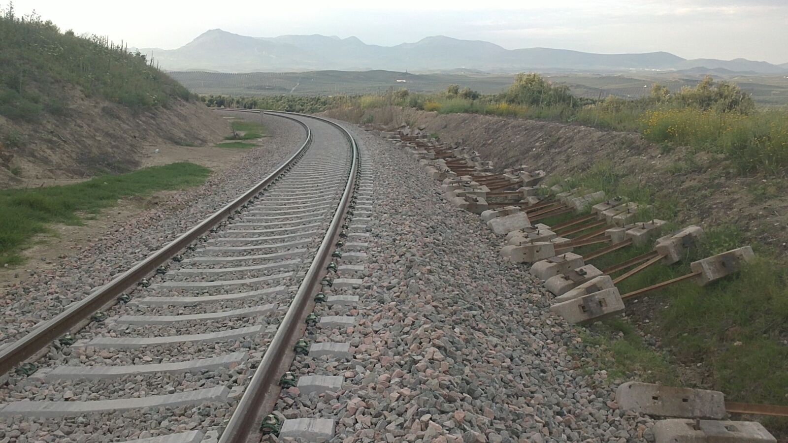 Sony Ericsson U5i sample photo. Train, sleepers, excavator photography