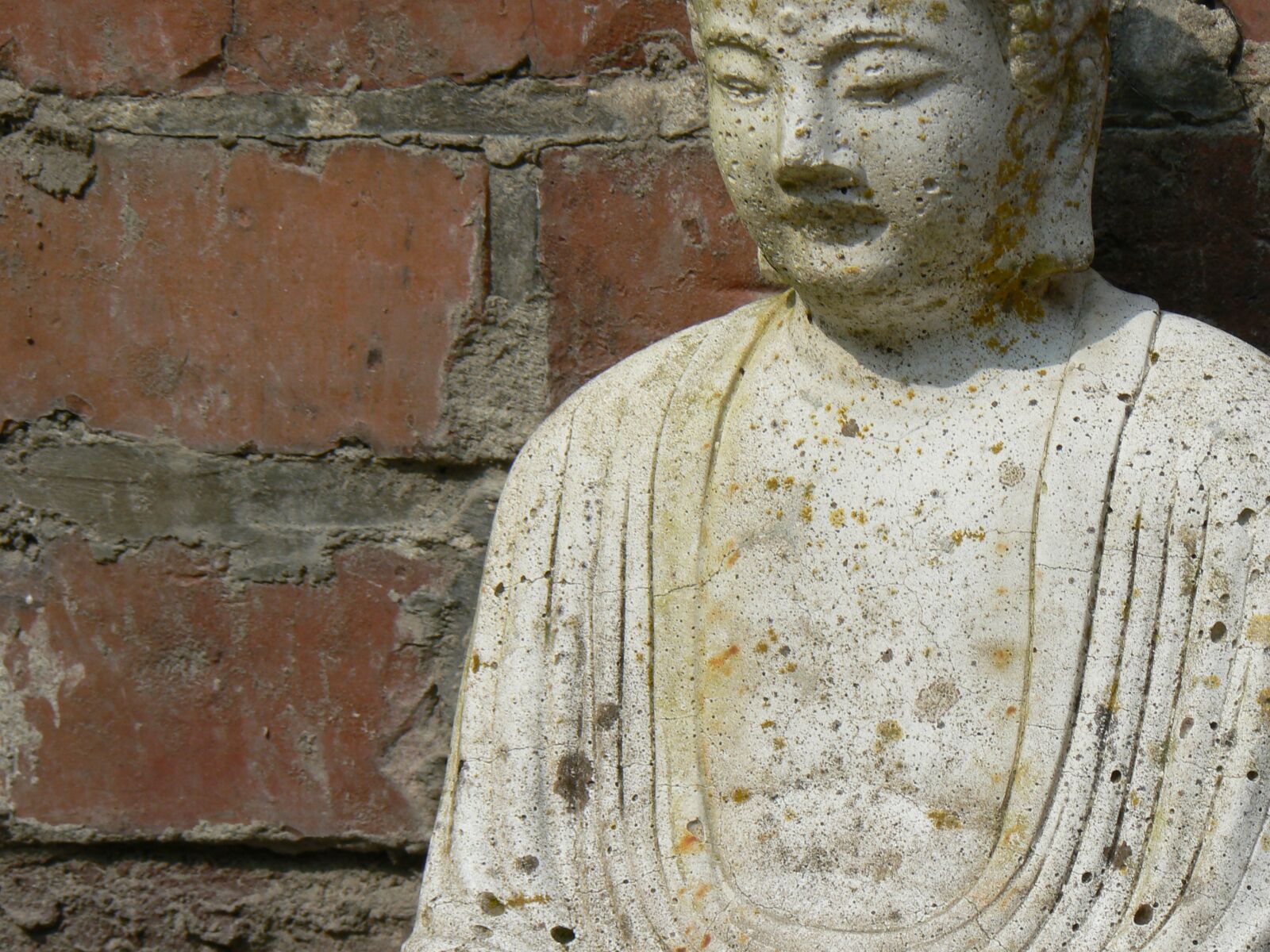 Panasonic DMC-FZ7 sample photo. Buddha, wall, background photography
