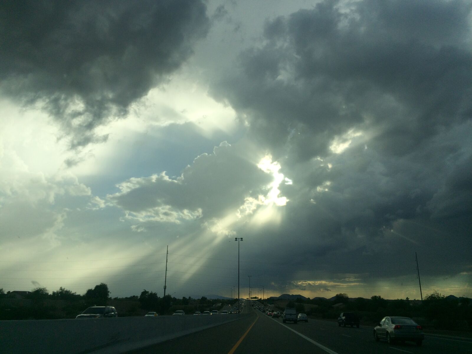 iPhone 5s back camera 4.12mm f/2.2 sample photo. Sunrays, clouds, storm clouds 222 photography