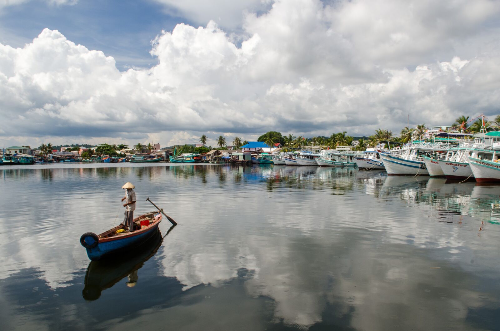 Nikon D7000 sample photo. Fisherman, boat, water photography