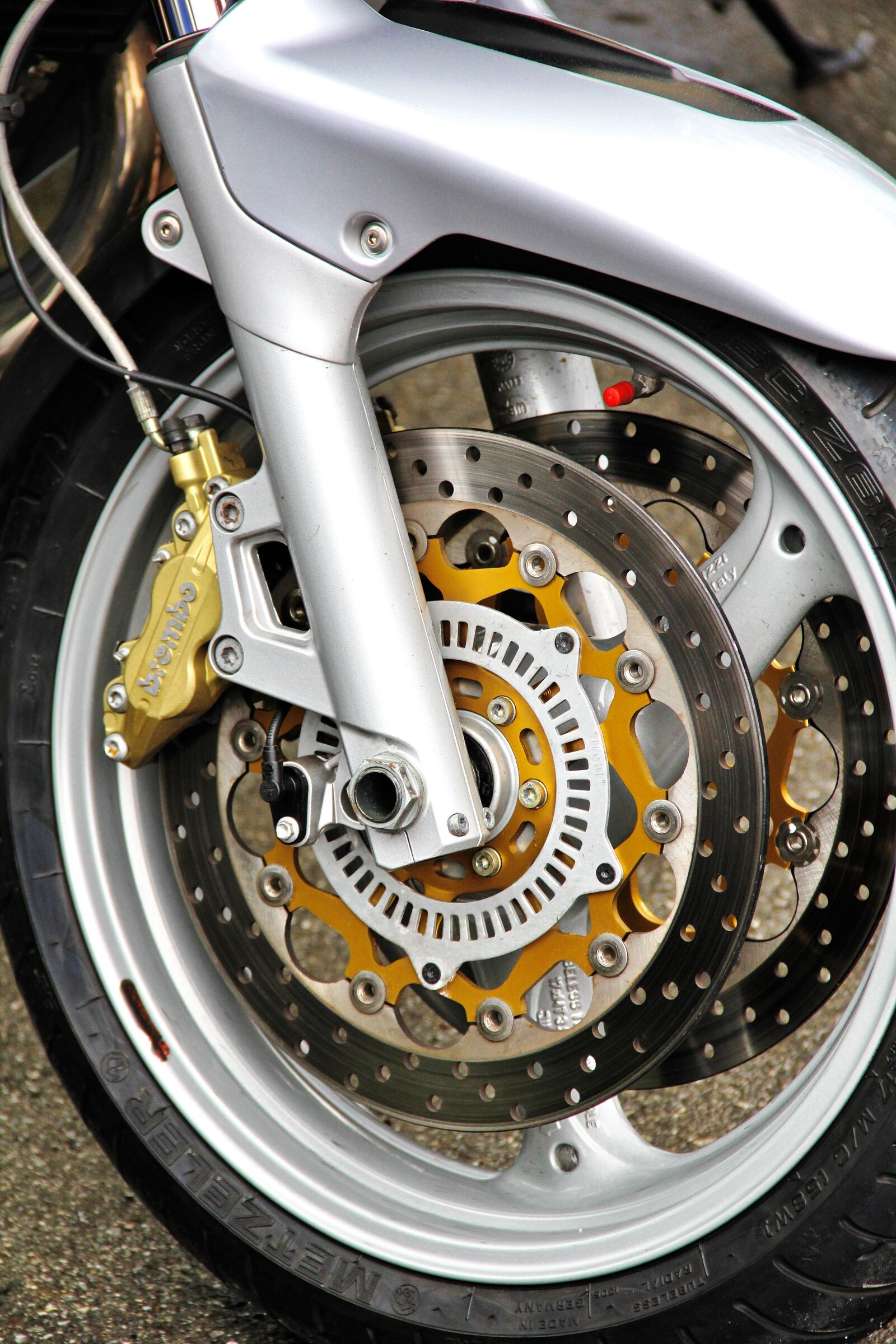 Canon EOS 60D sample photo. Motorcycle, front wheel, two photography
