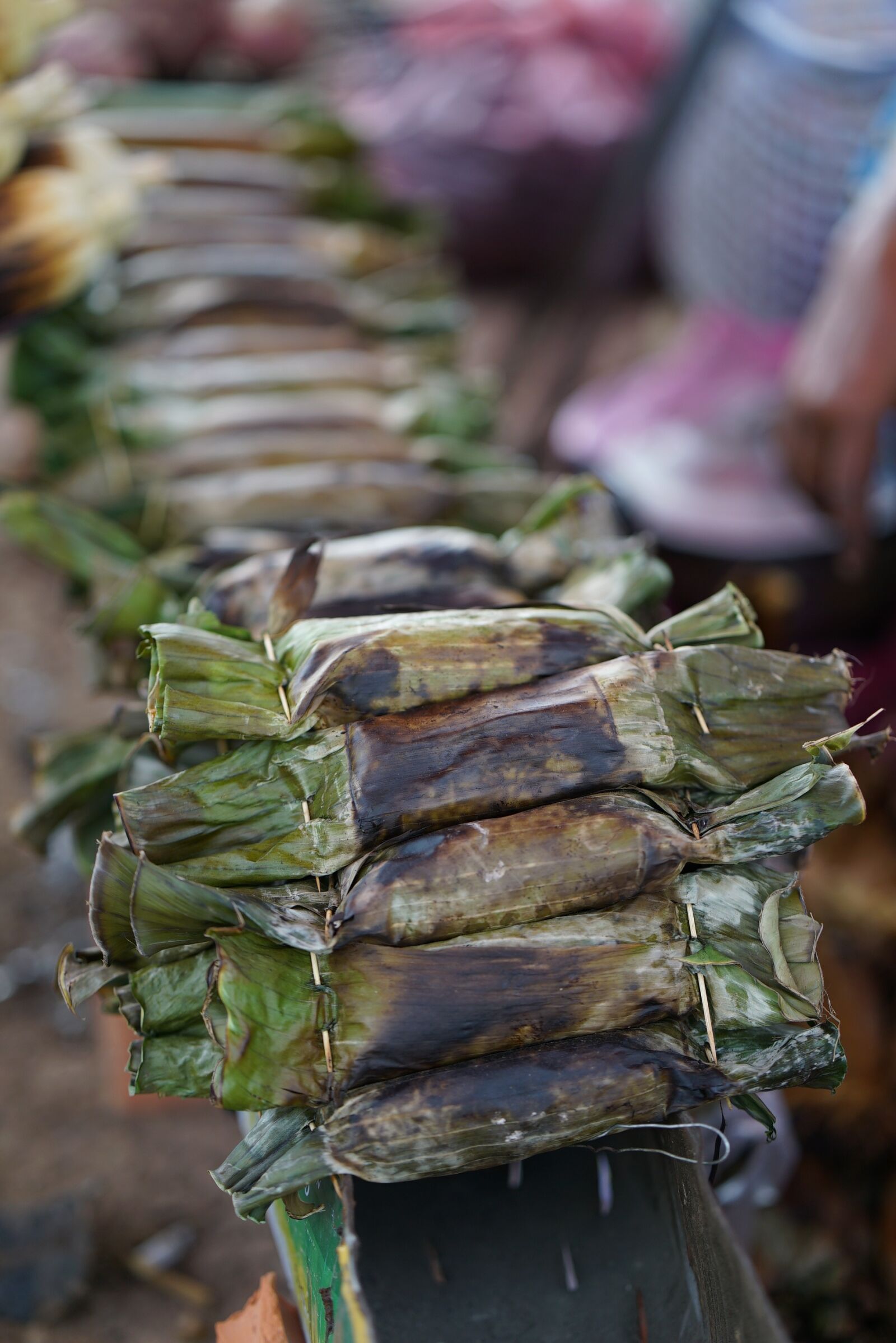 ZEISS Batis 85mm F1.8 sample photo. Road, banana leaves, vegan photography