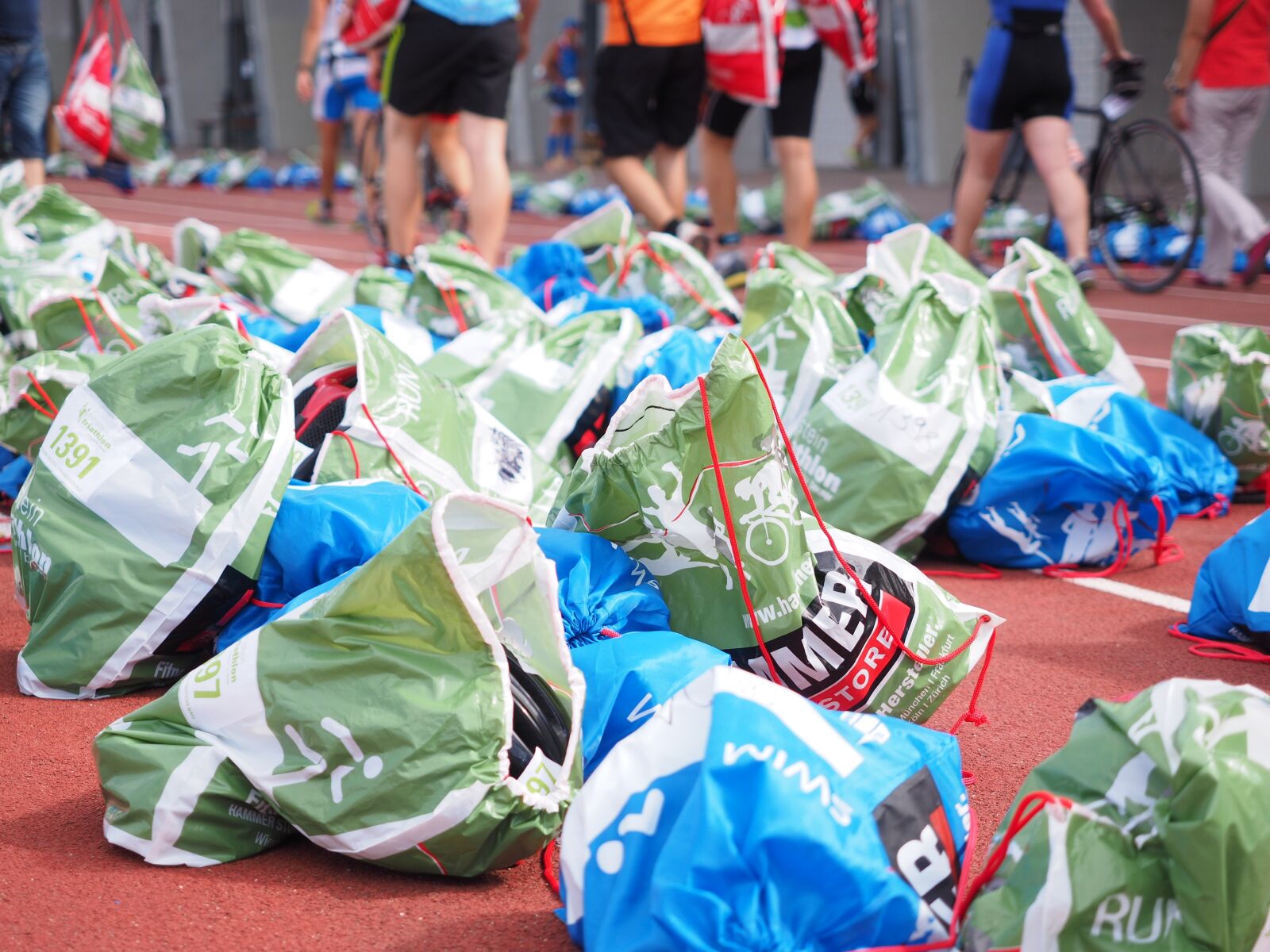 Olympus OM-D E-M1 + Olympus M.Zuiko Digital ED 12-40mm F2.8 Pro sample photo. Plastic bag, sport event photography