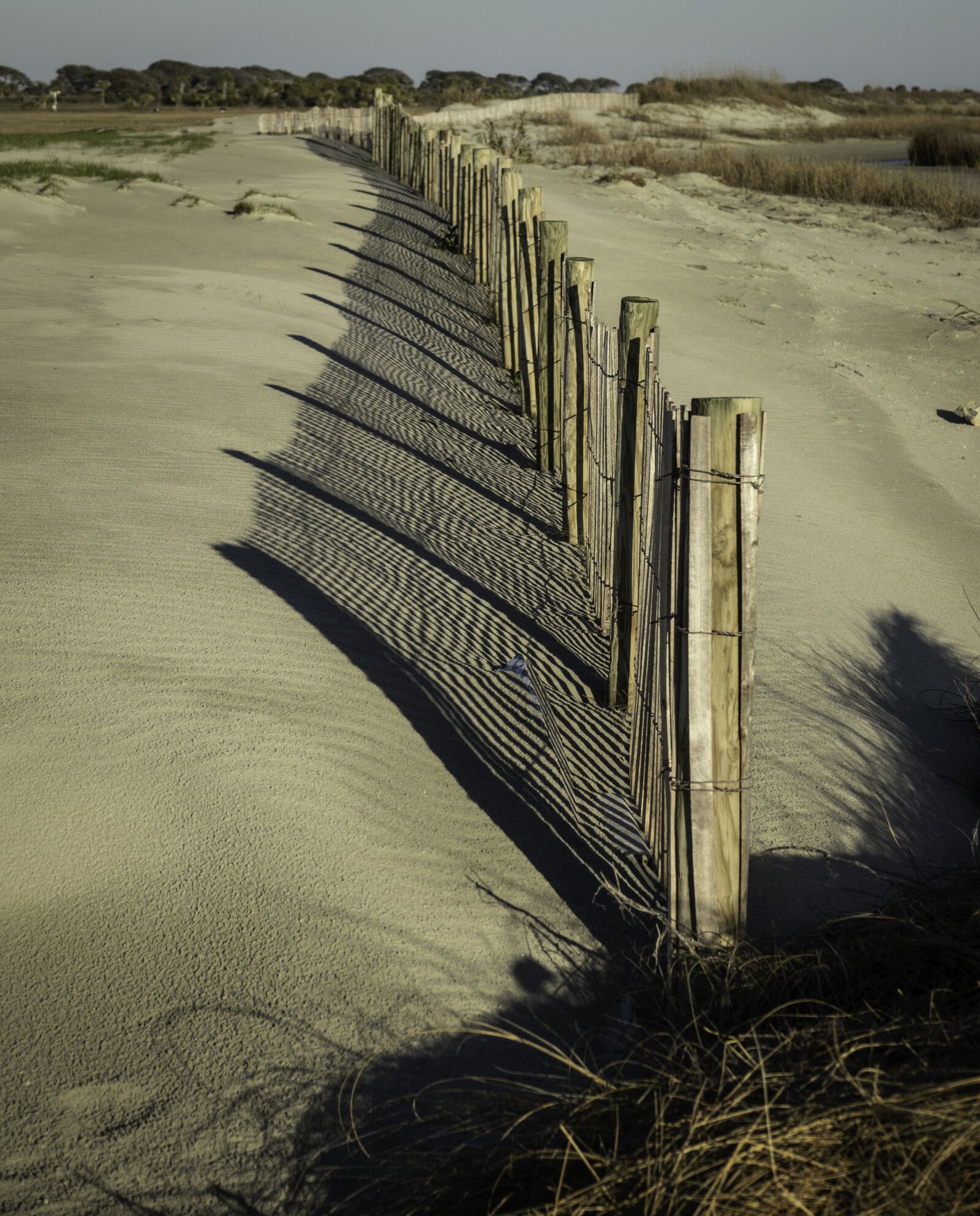 Sony Cyber-shot DSC-RX10 III sample photo. Dunes, fence, shadow photography