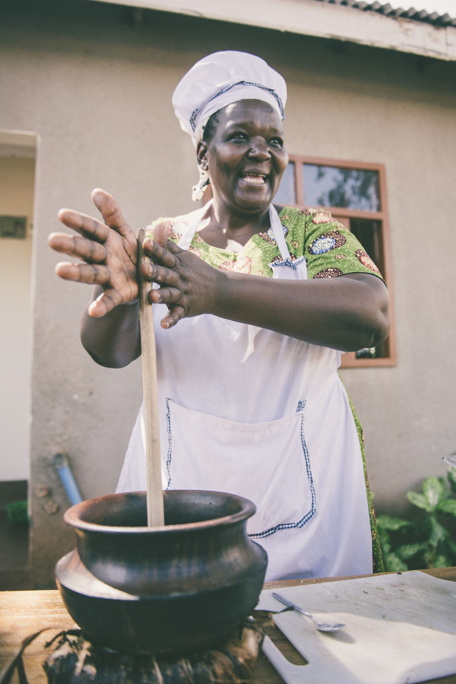 Nikon D750 sample photo. African, cooking, woman photography