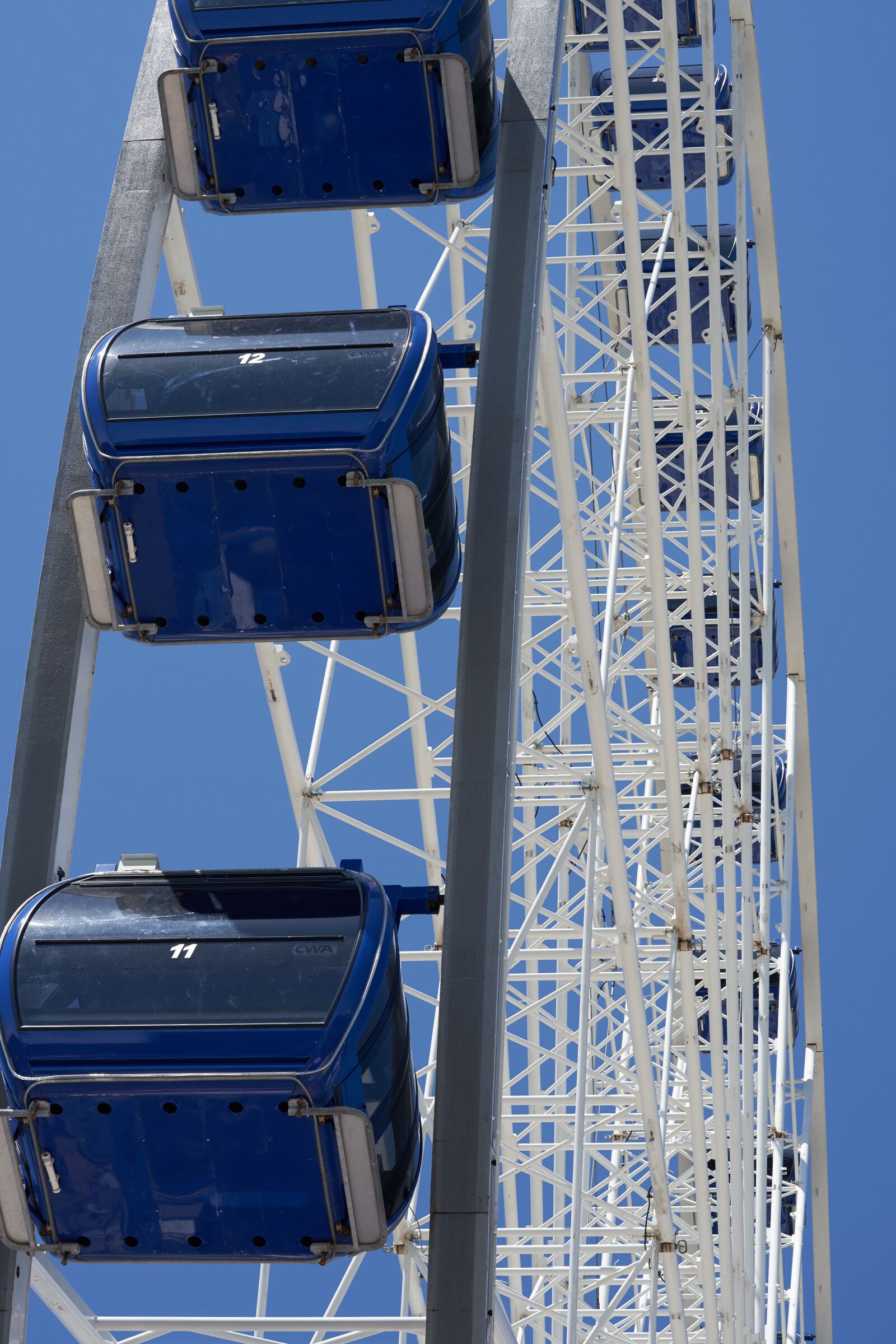 Sony FE 90mm F2.8 Macro G OSS sample photo. Ferris wheel, sky, carousel photography
